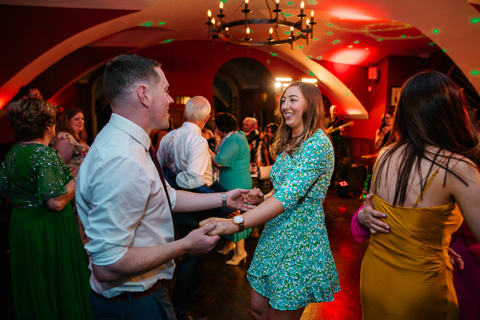 A man and woman dancing at a party