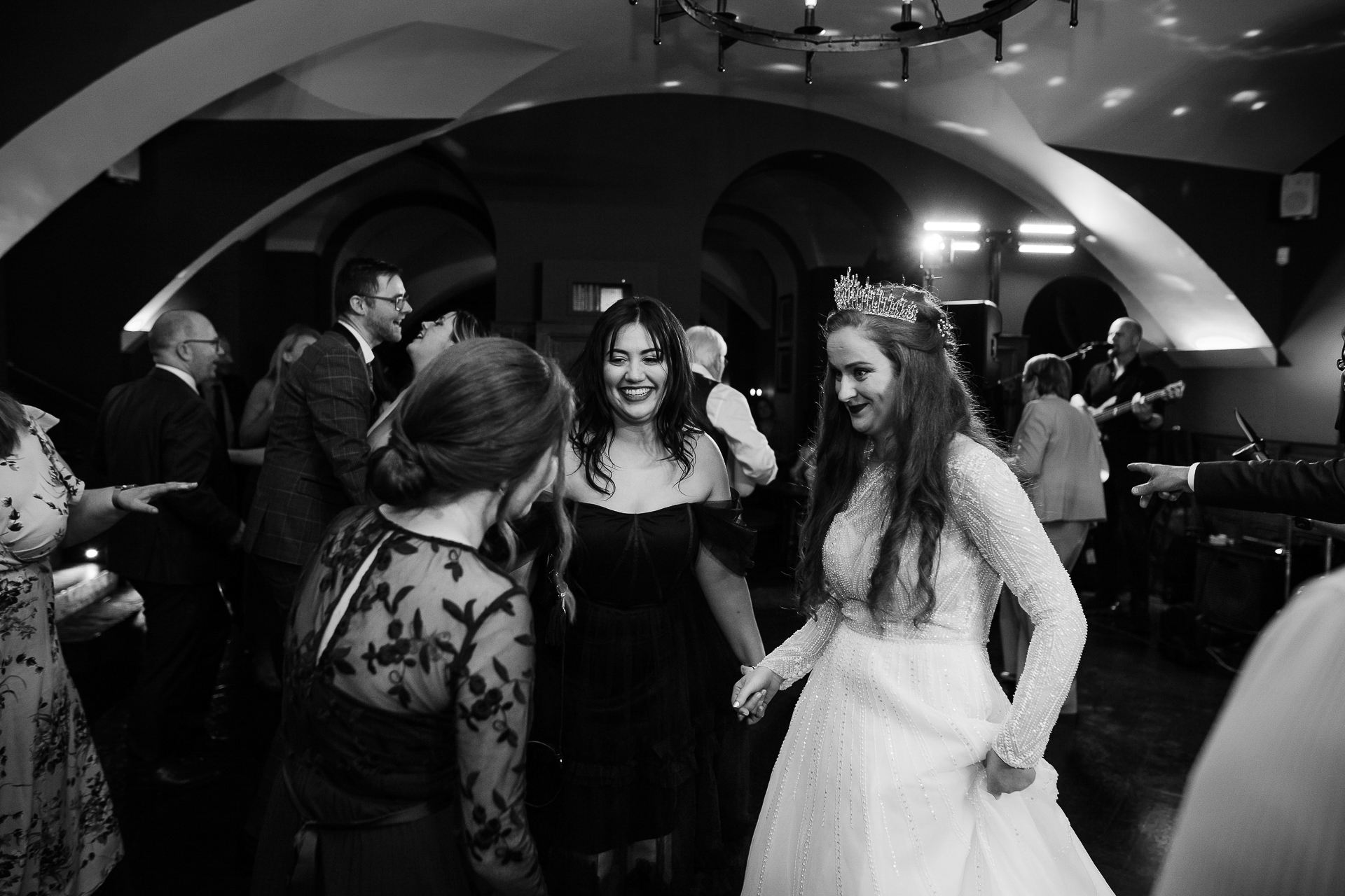 A person in a wedding dress and a person in a tiara