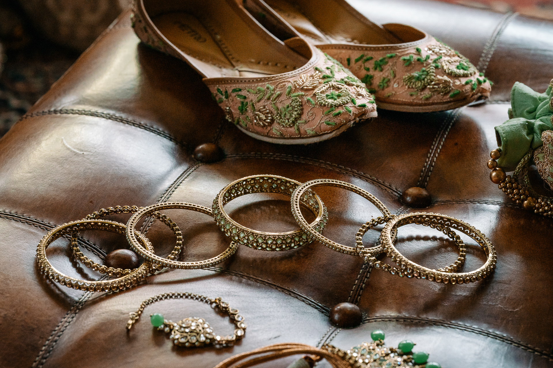 A group of gold sandals