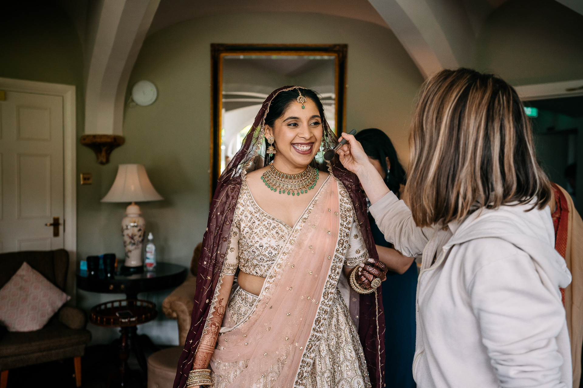 A woman in a dress smiling