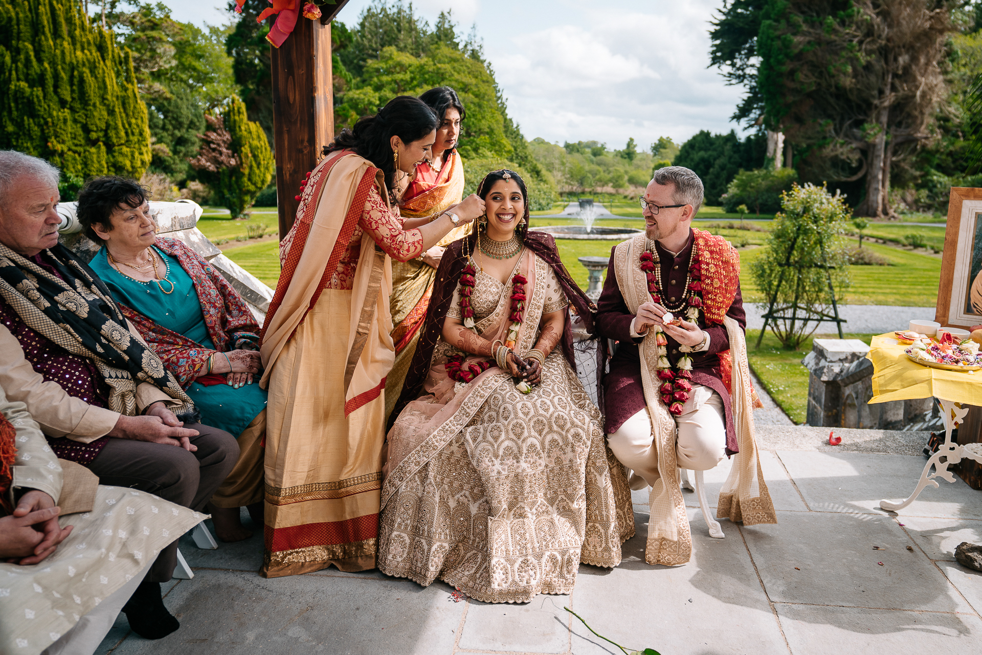 A group of people sitting outside