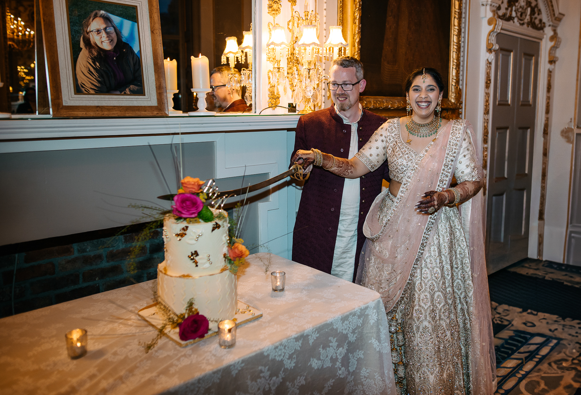 A bride and groom cutting a wedding cake