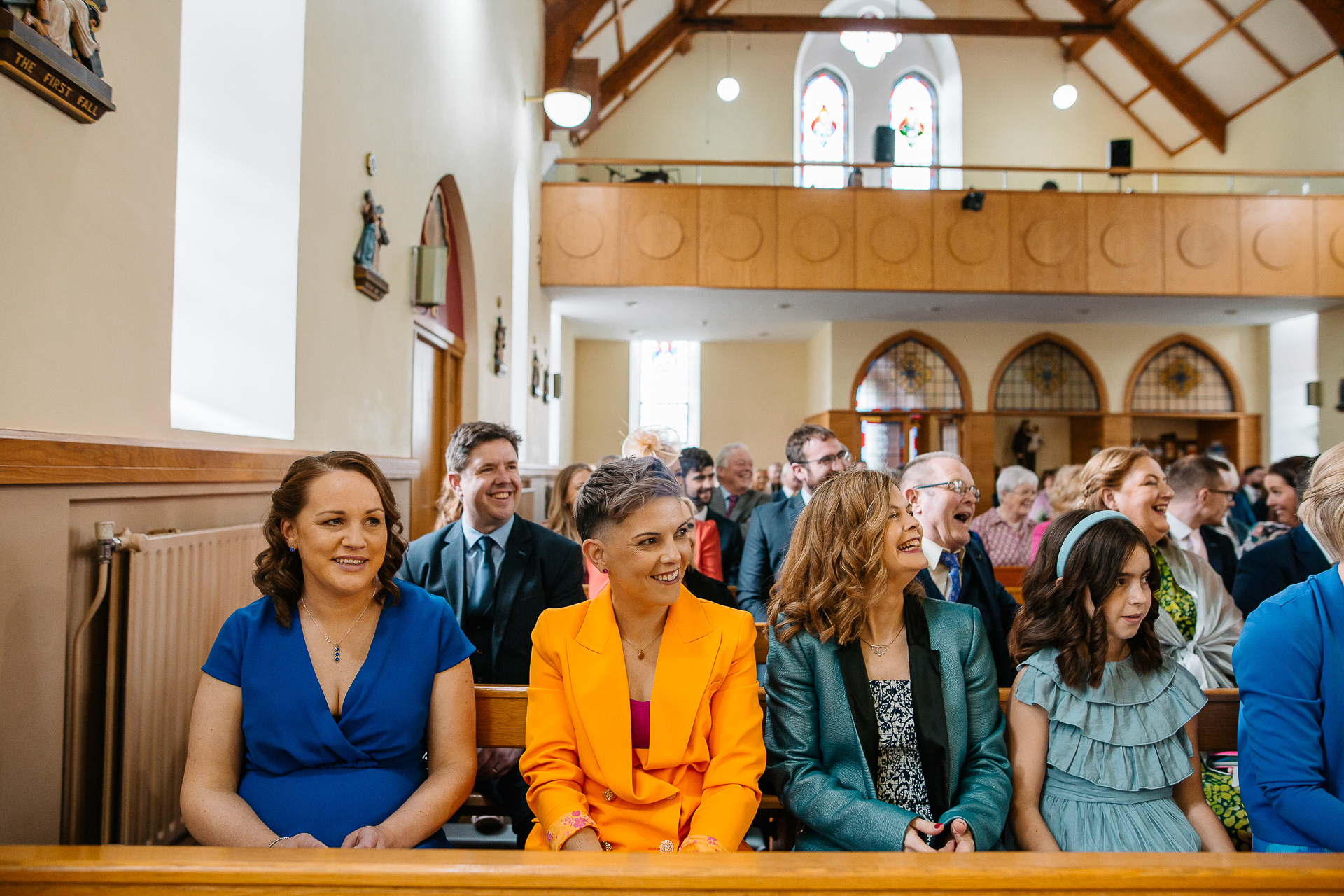 A group of people sitting in a church