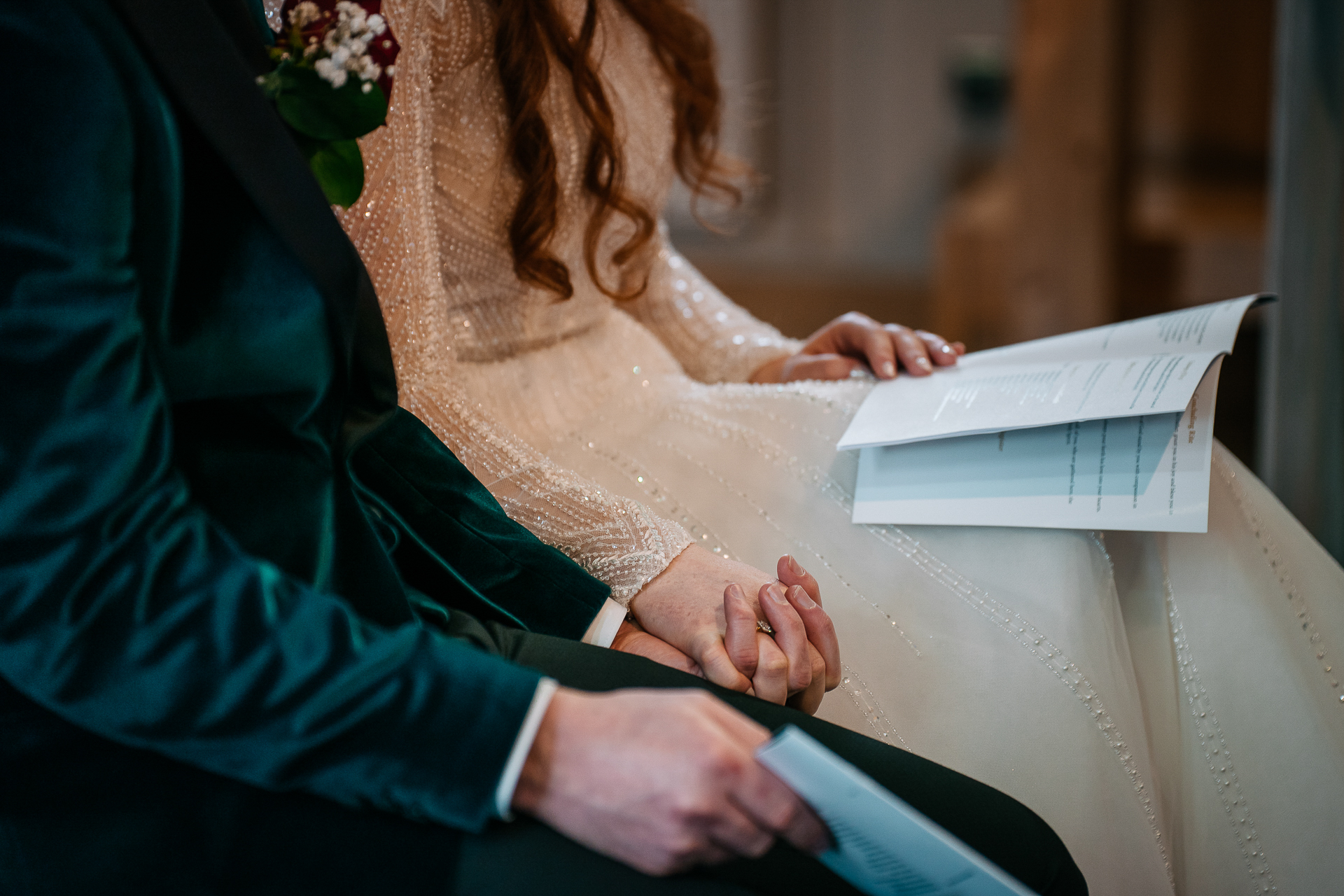 A woman and a man looking at a laptop