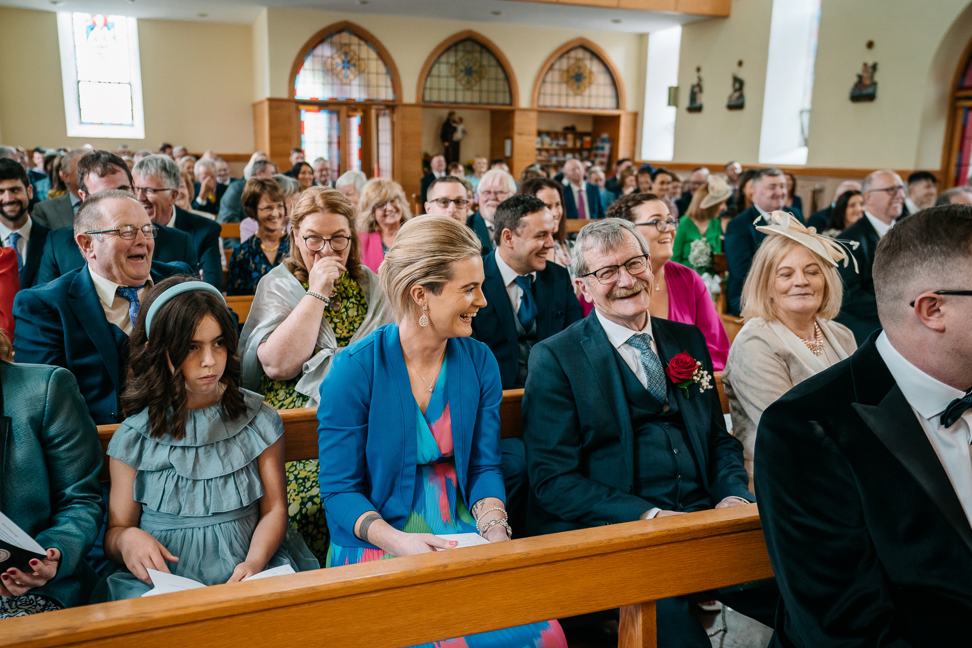 A group of people sitting in a room