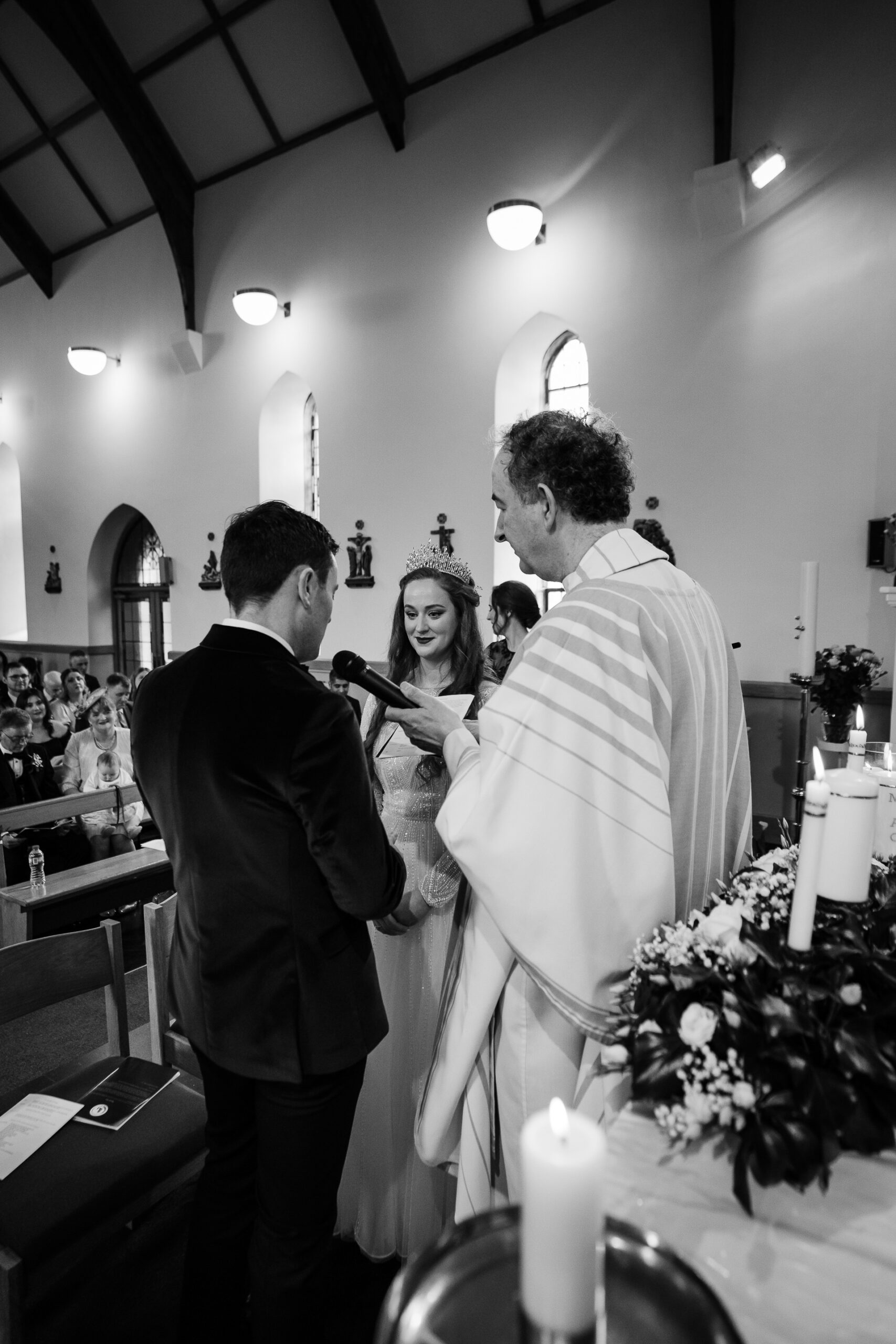 A person getting a wedding cake