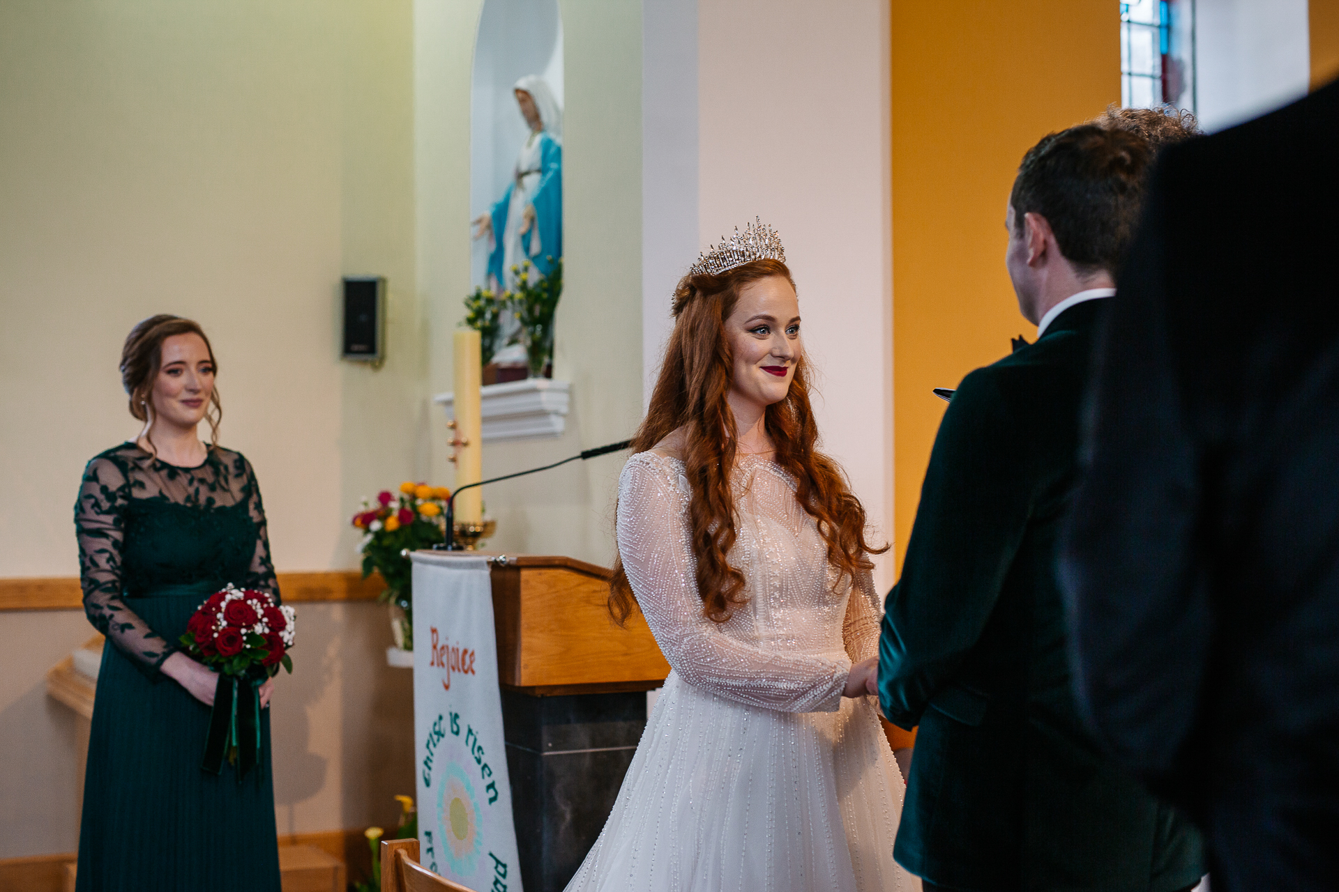 A woman in a white dress and a man in a suit