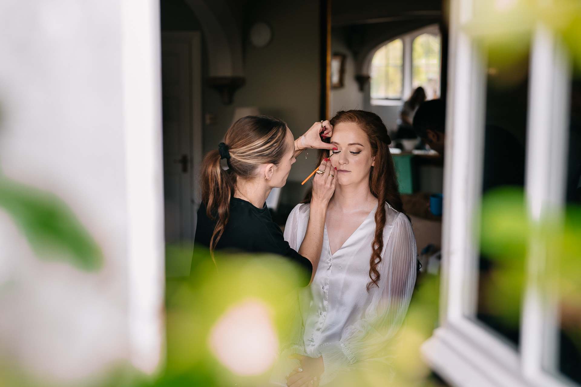 A woman looking at another woman