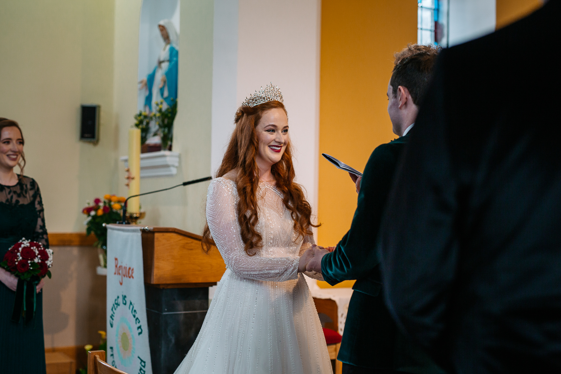 A woman in a crown and a man in a suit