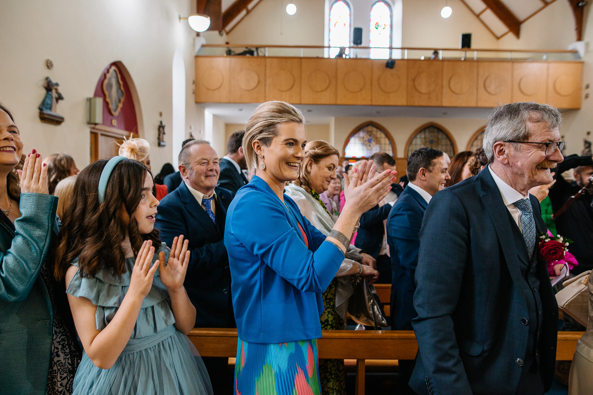 A group of people clapping