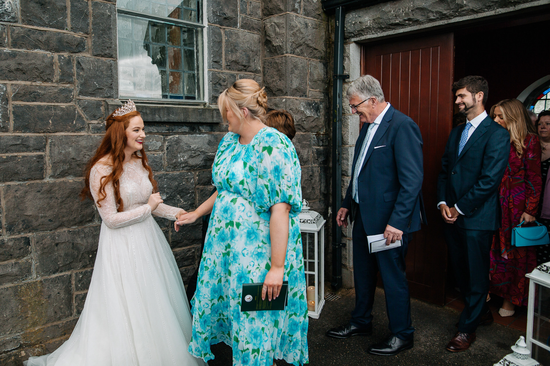 A bride and groom walking down the aisle