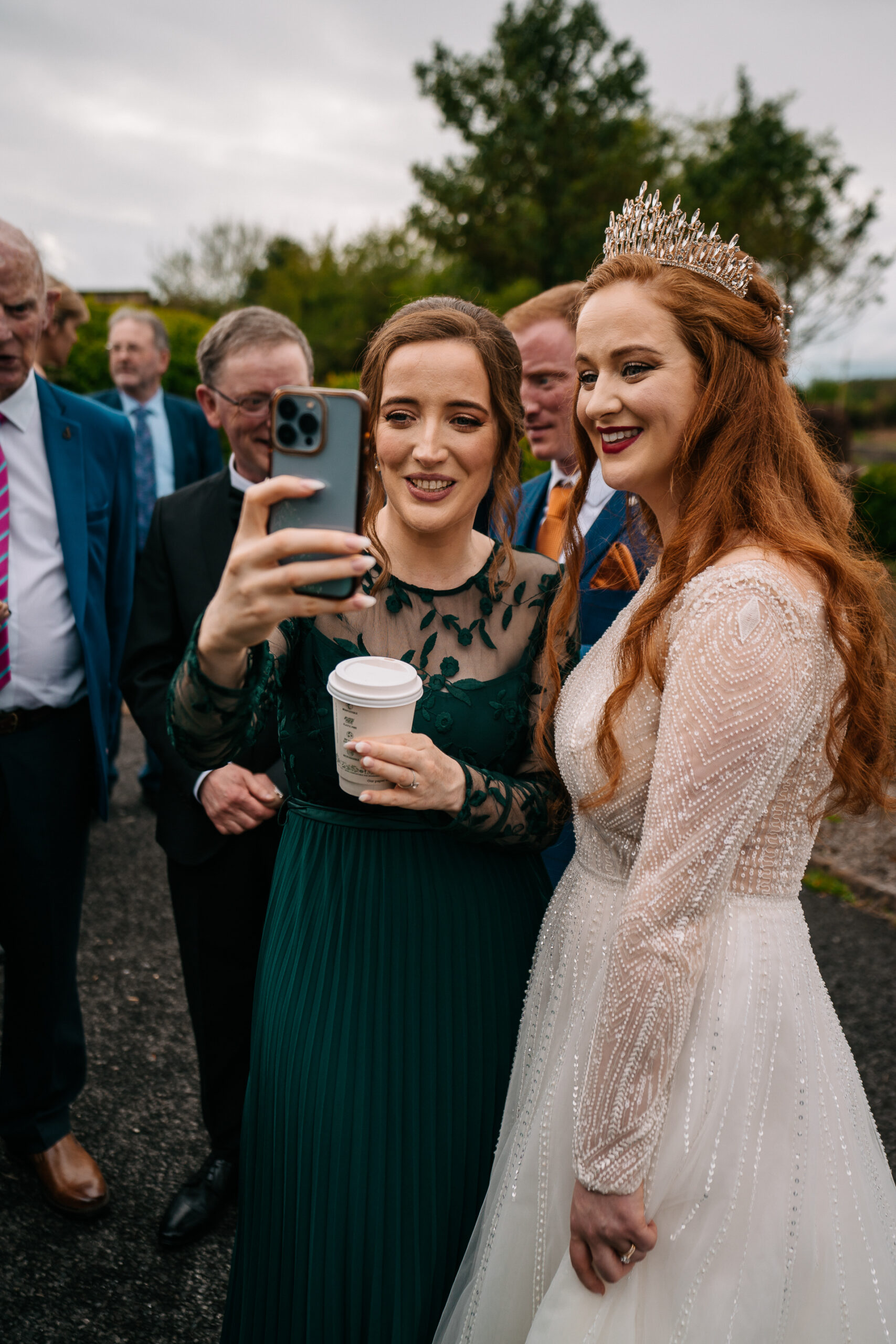 A couple of women in formal wear