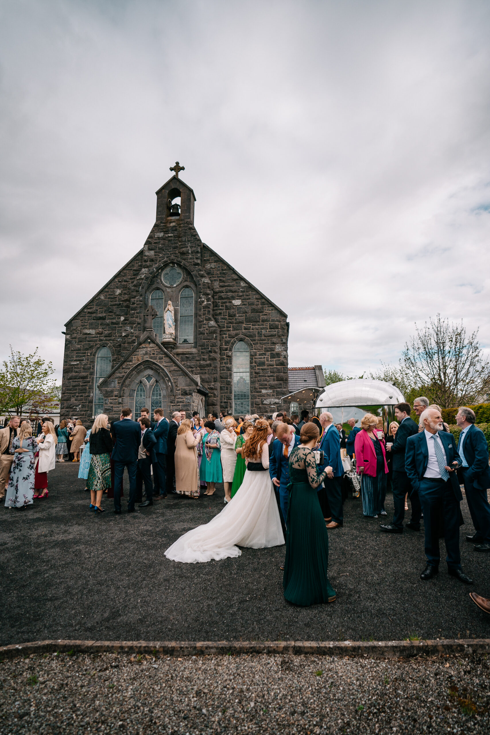 A group of people outside a church