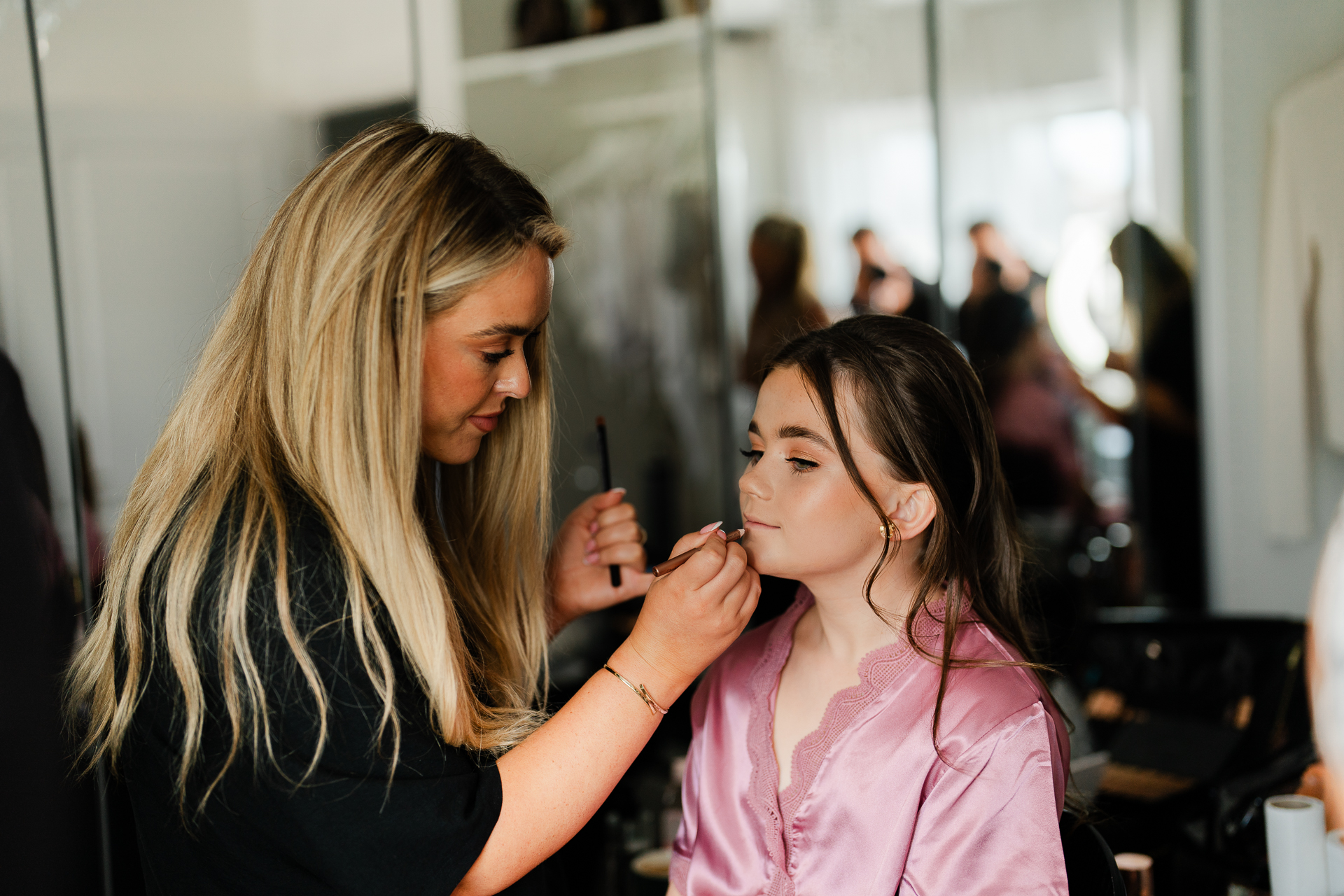 A woman getting her hair done