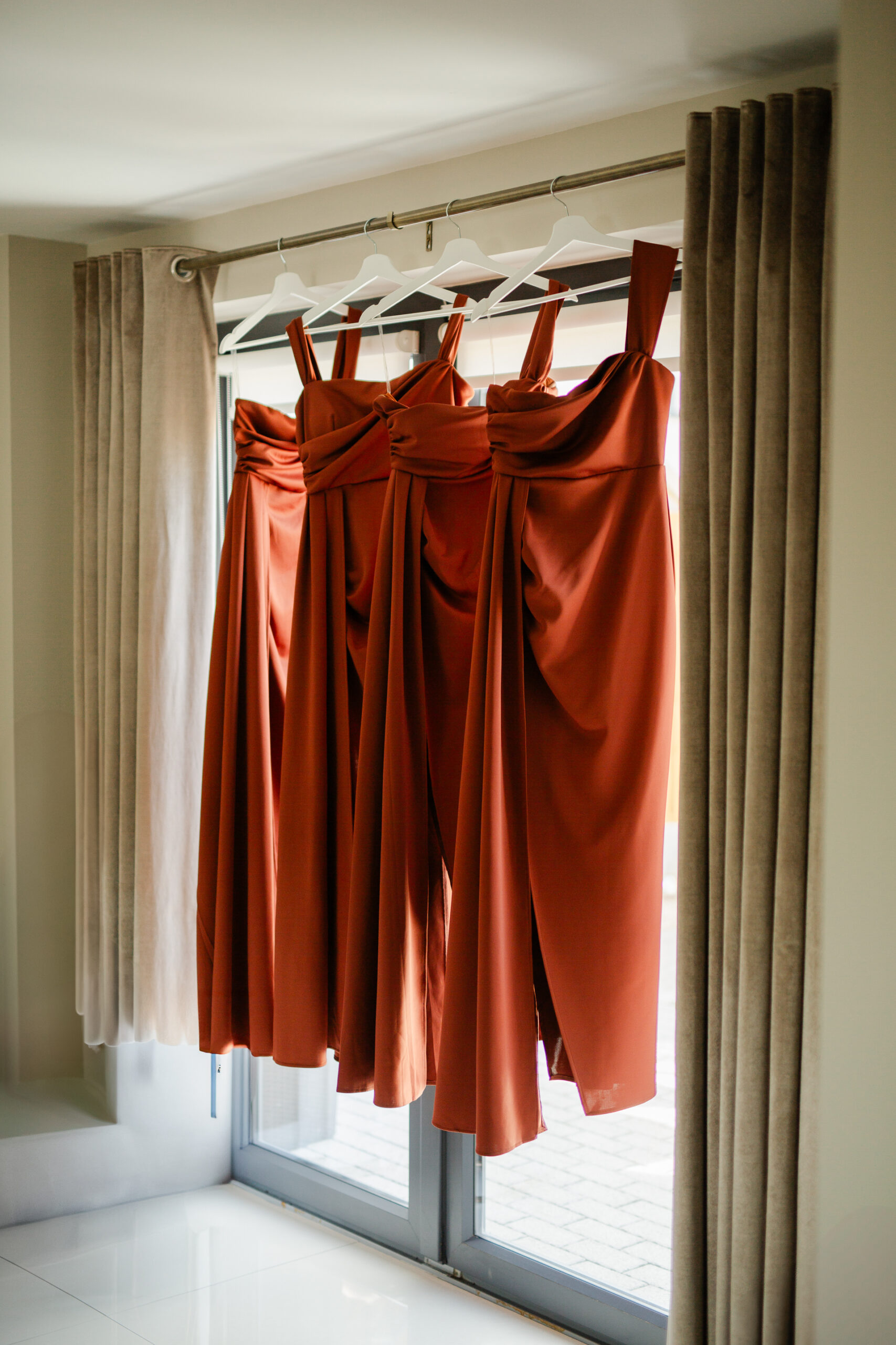 A red dress on a swinger in a room