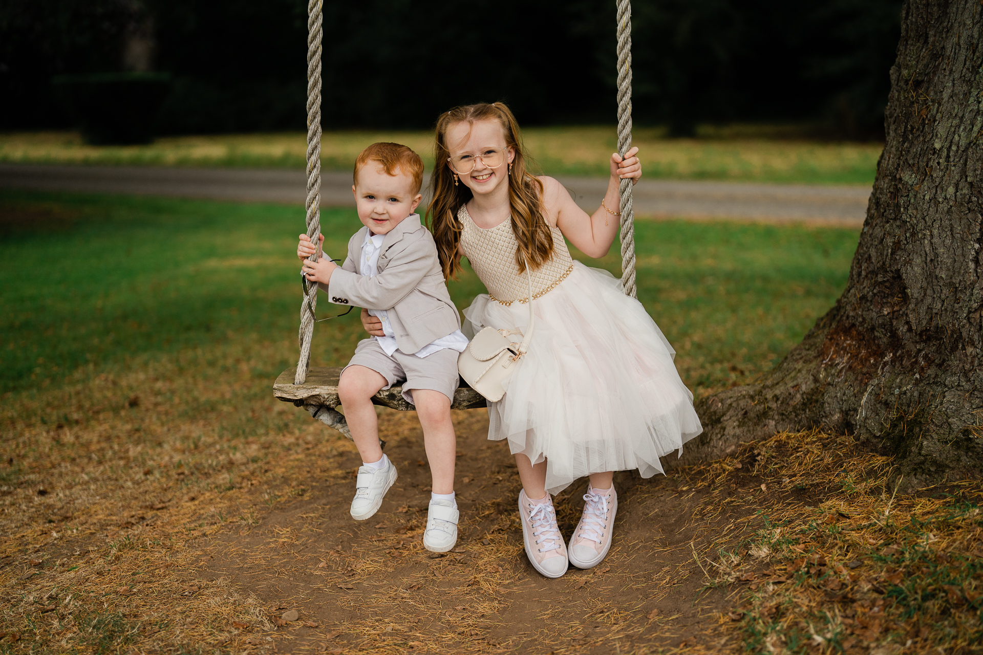 A person and a child on a swing