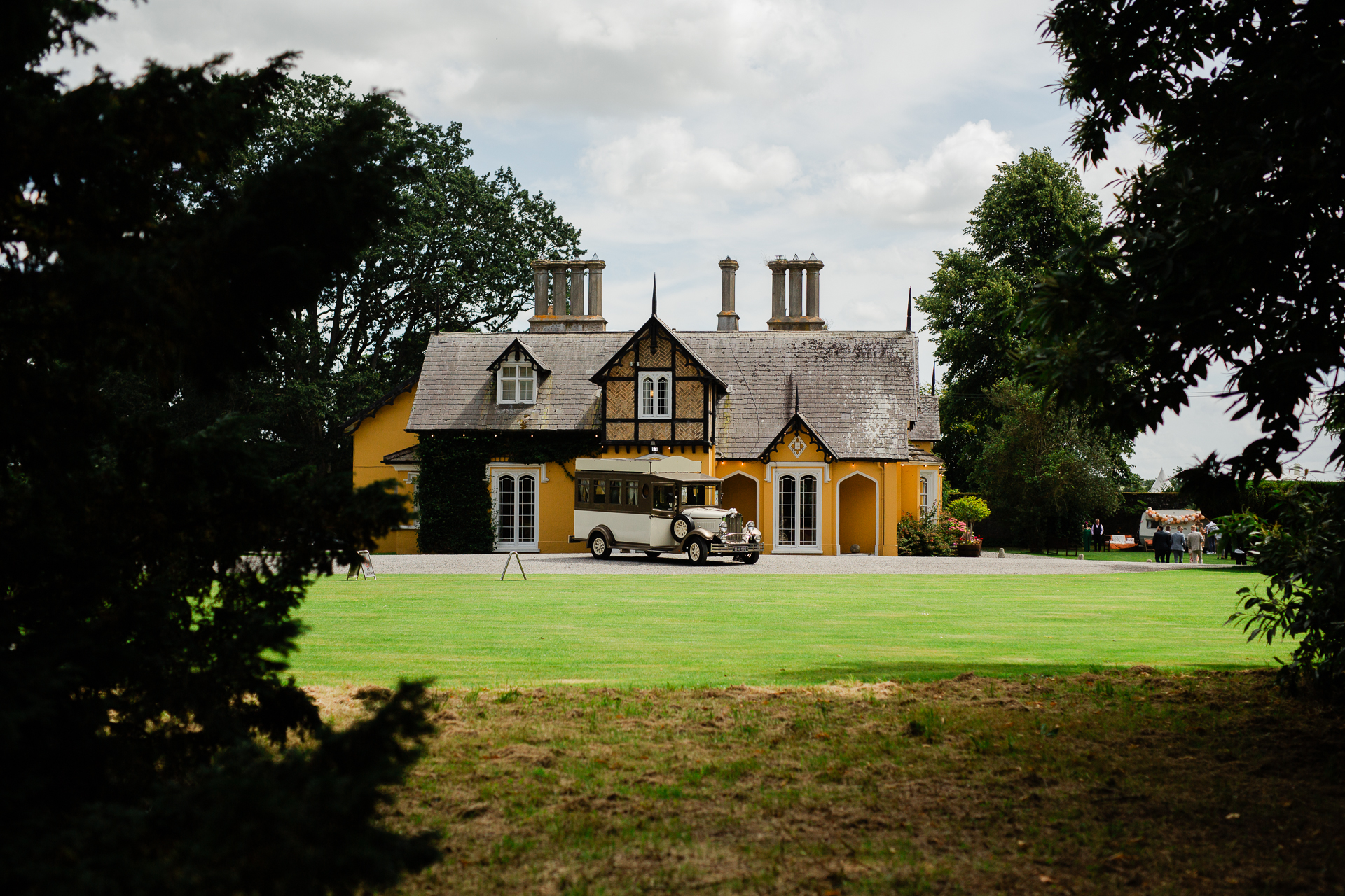 A house with a lawn and trees