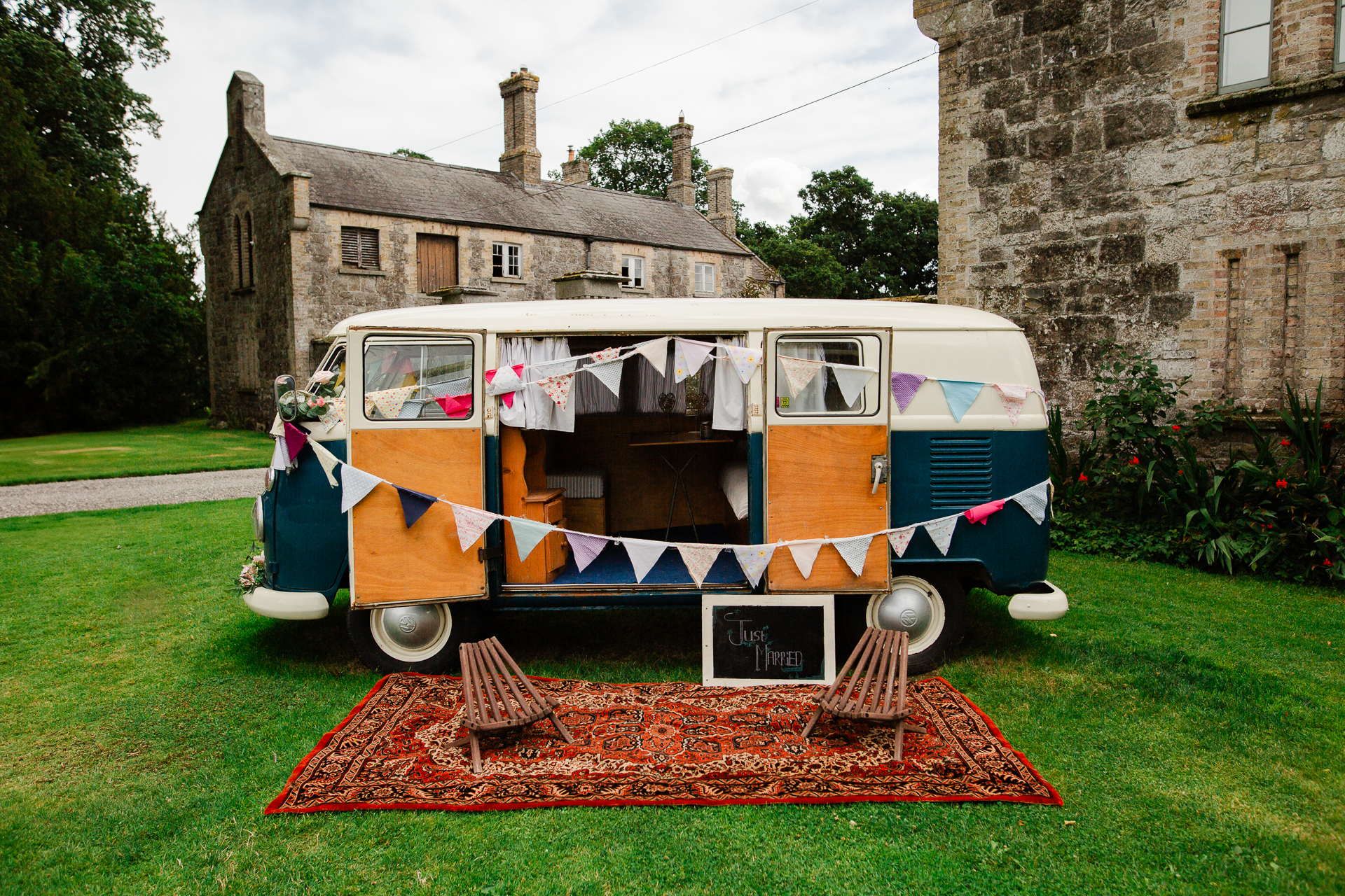 A van with a canopy on grass