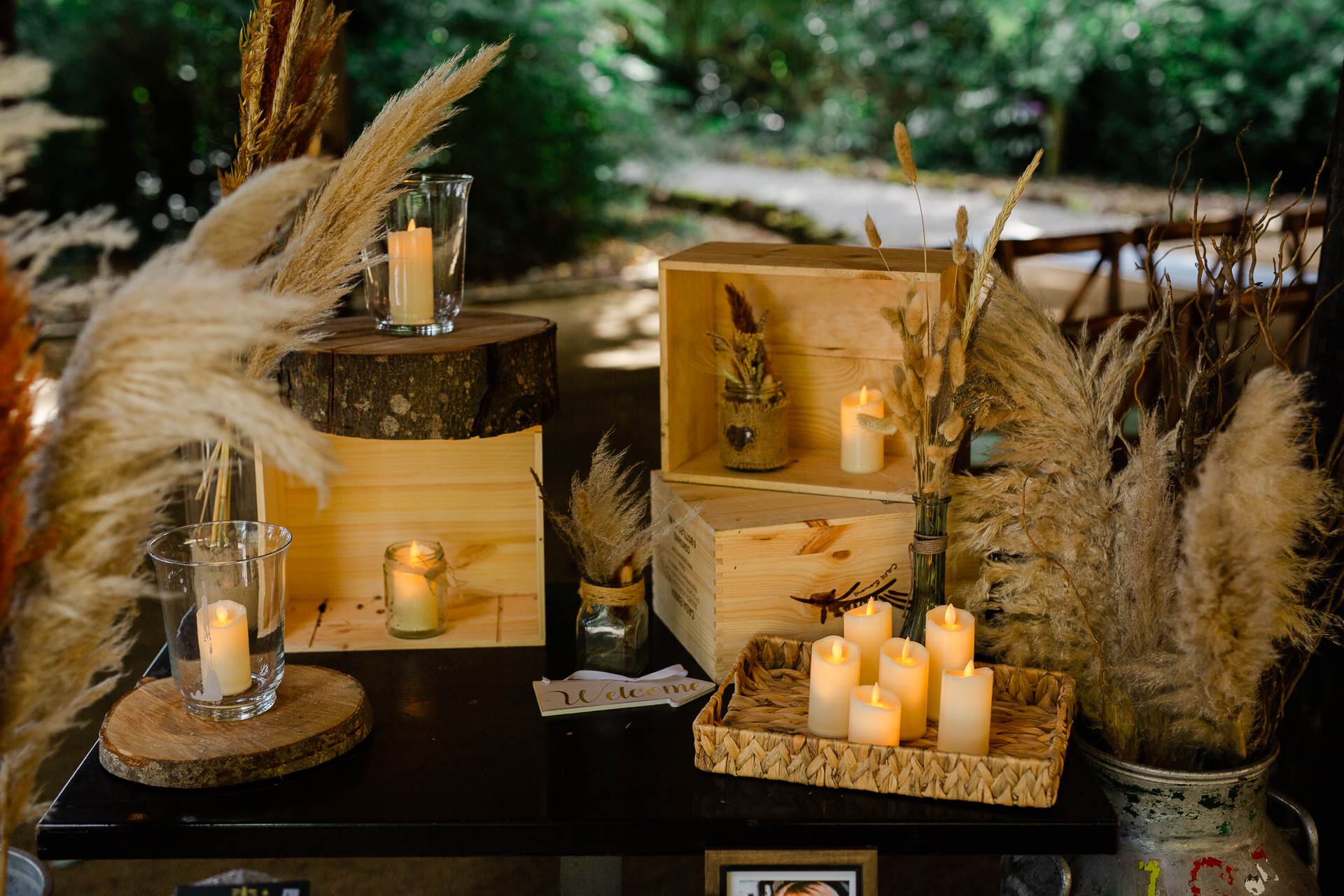 A table with candles and a statue