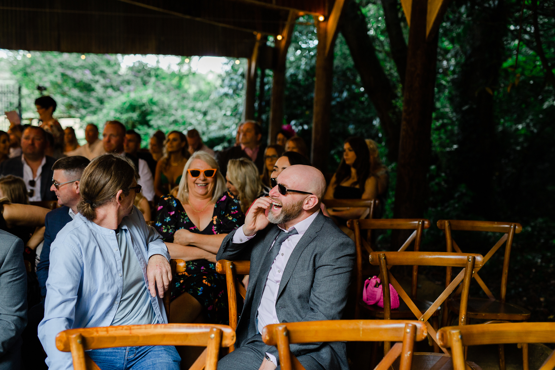 A group of people sitting in chairs