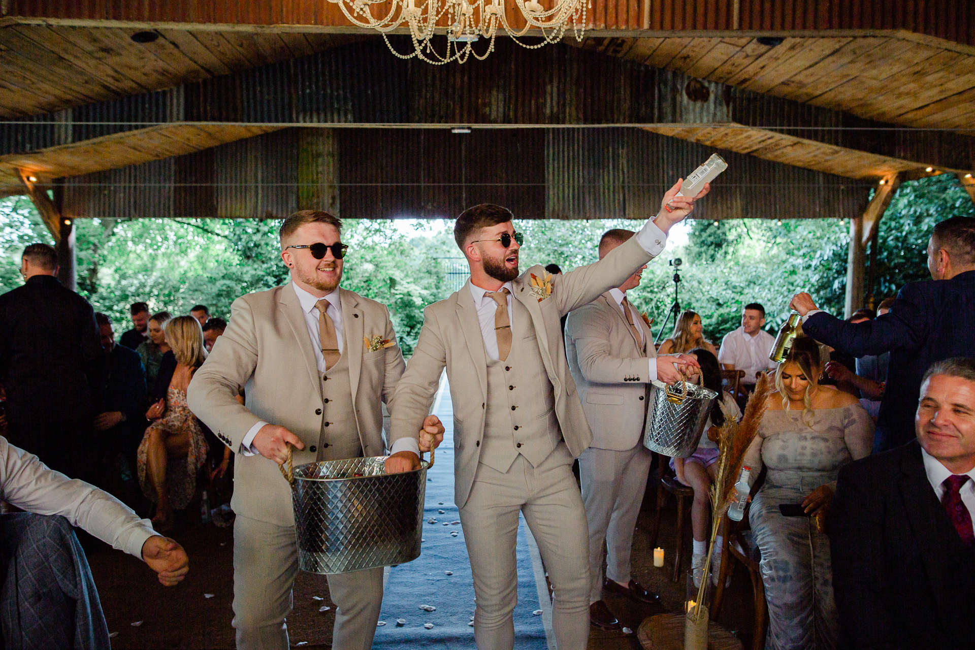 A couple of men holding a basket