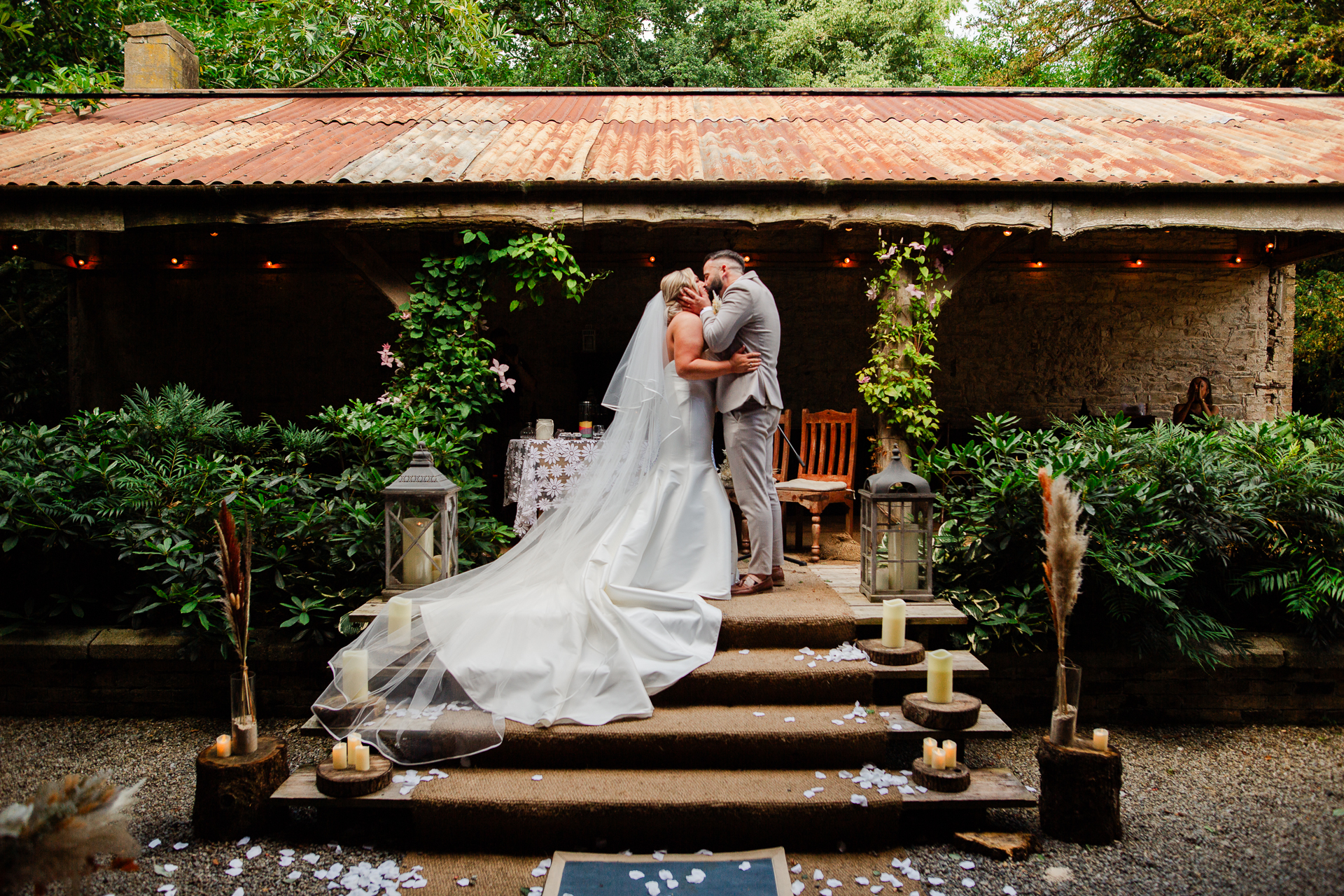 A bride and groom kissing