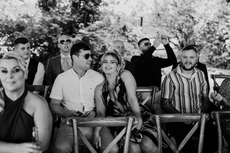 A group of people sitting on a bench