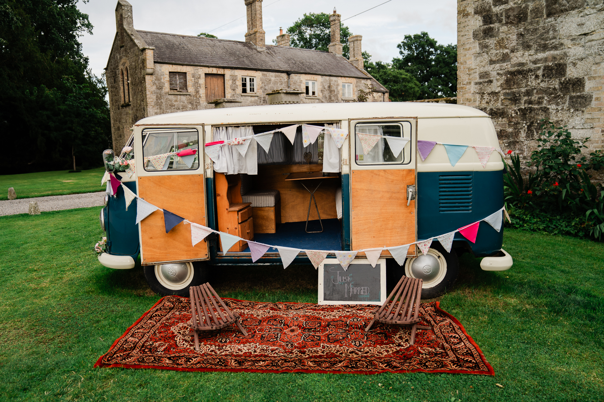 A small camper with a trailer