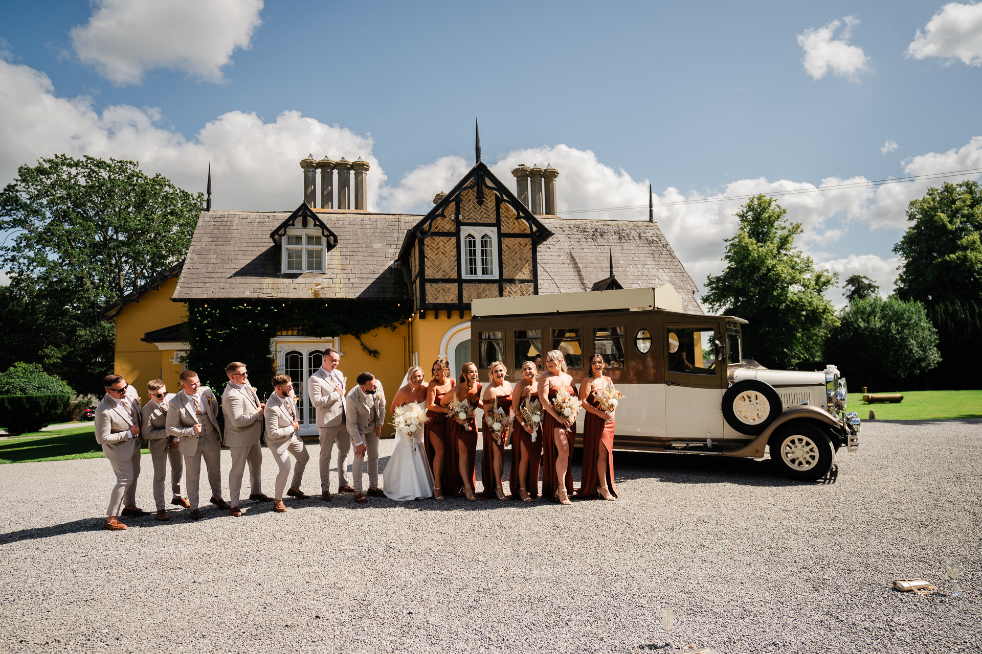 A group of people standing in front of a truck