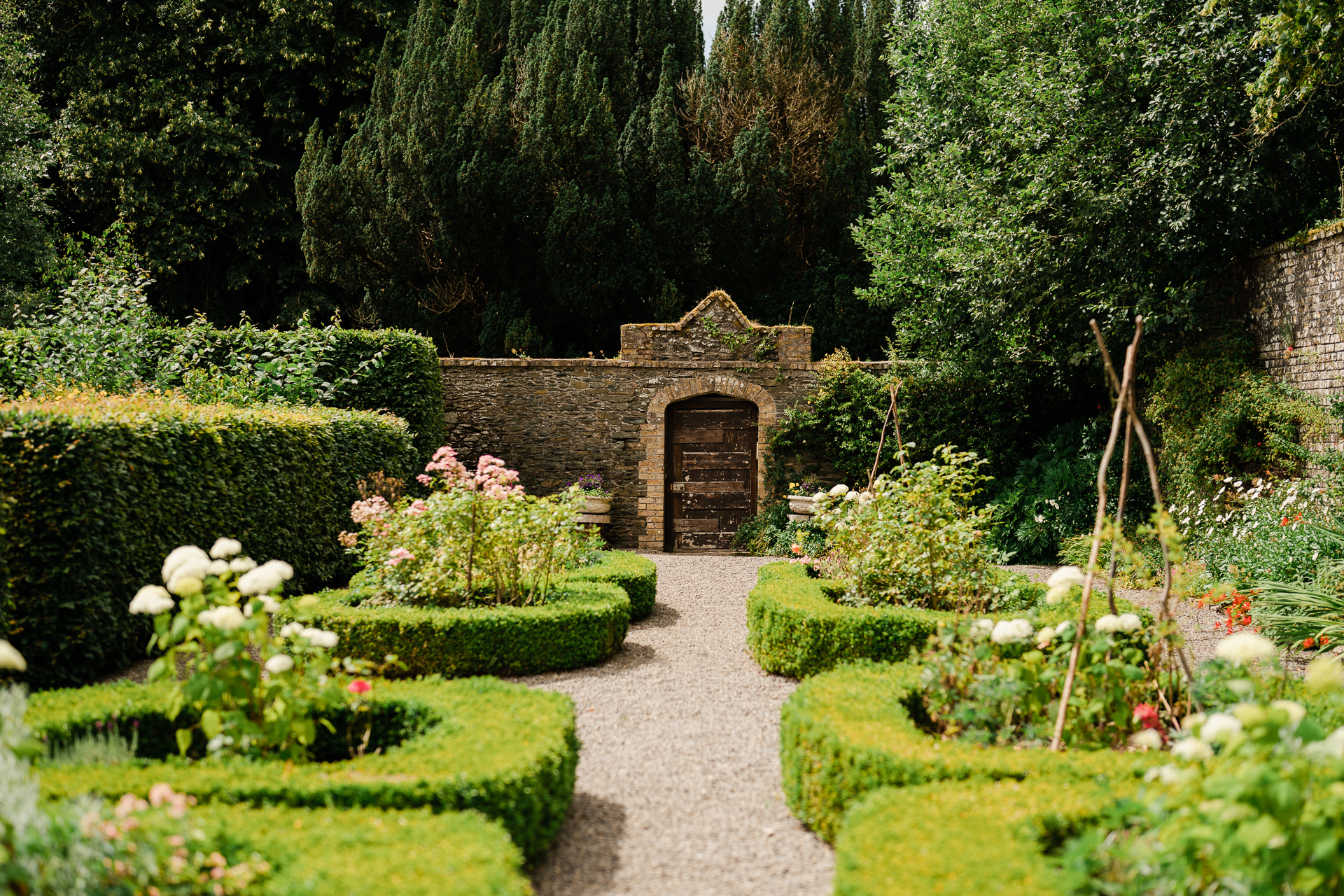 A garden with a stone path