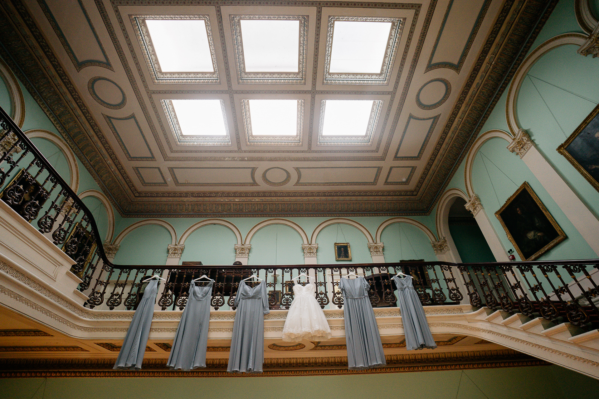 A room with a large staircase and a large window