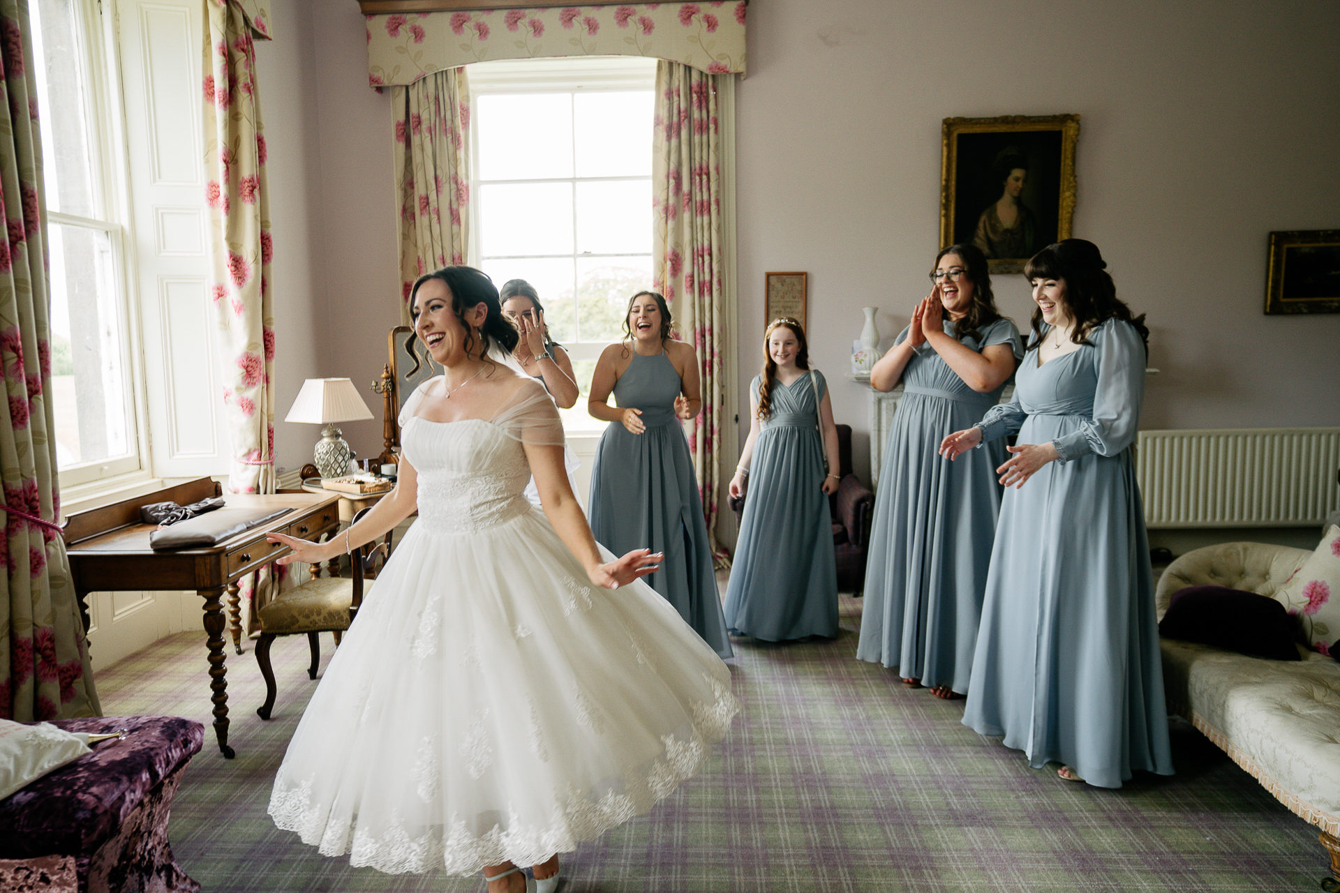 A group of women in dresses