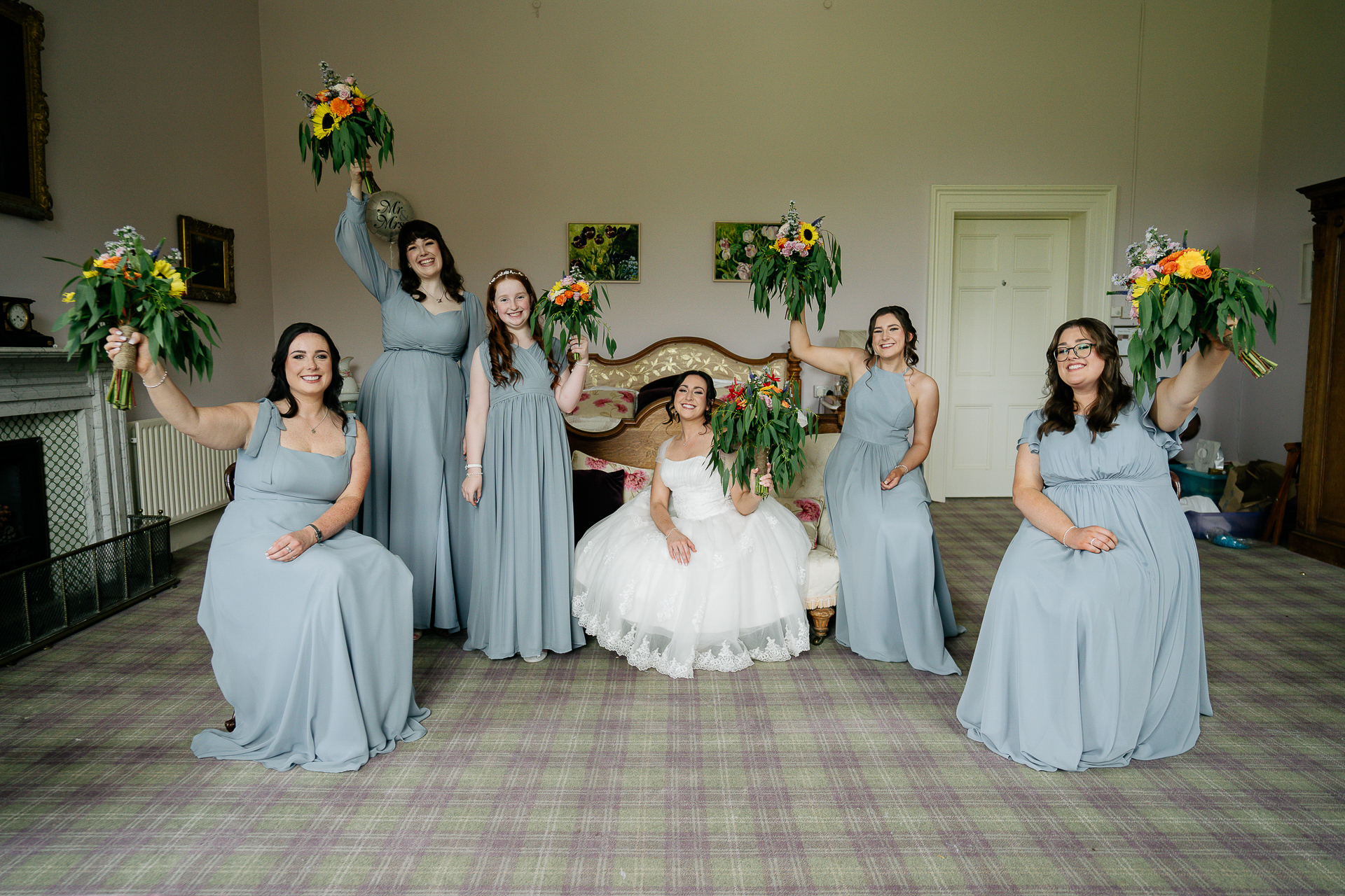 A group of women in dresses