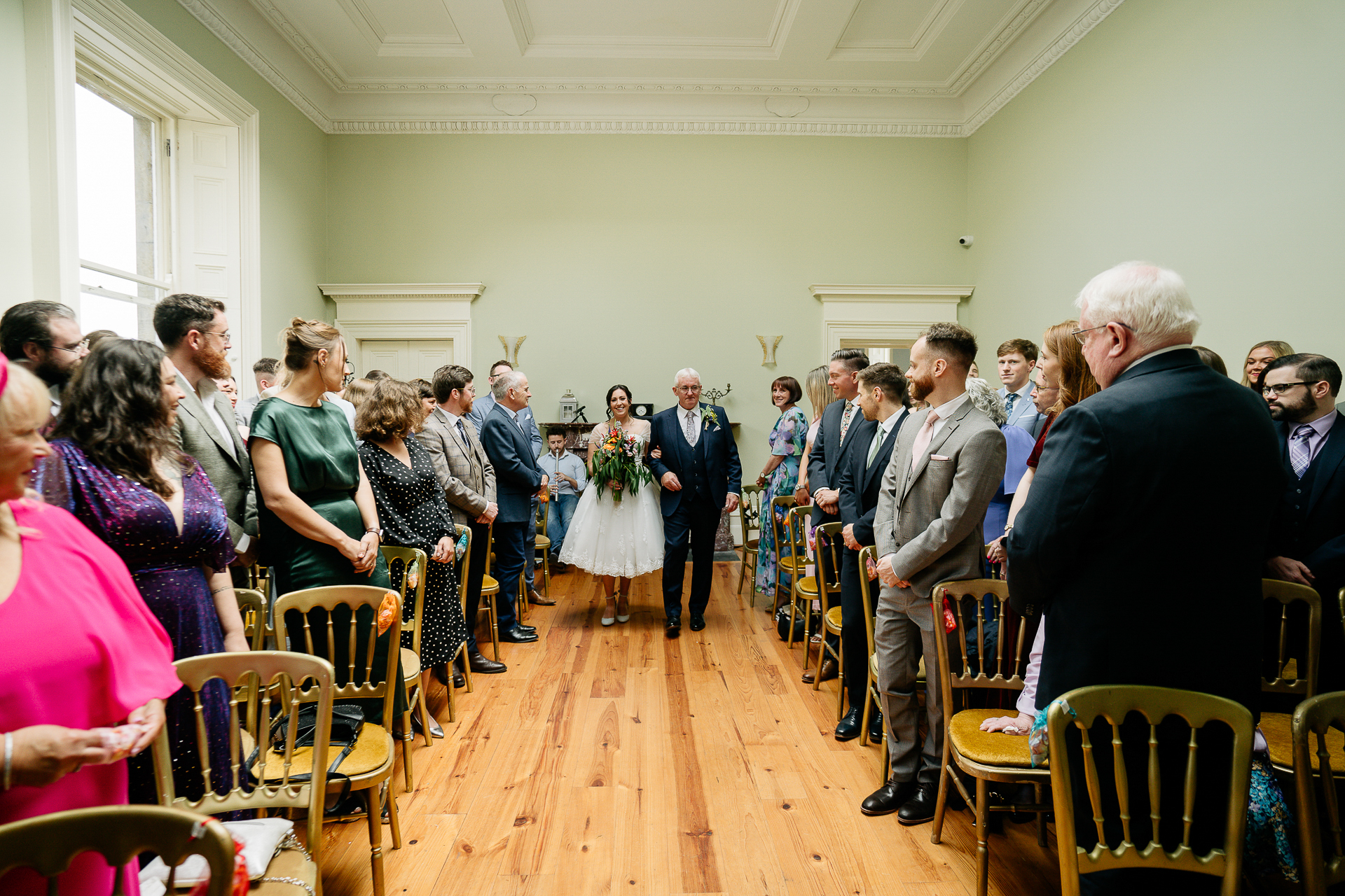 A wedding party in a room