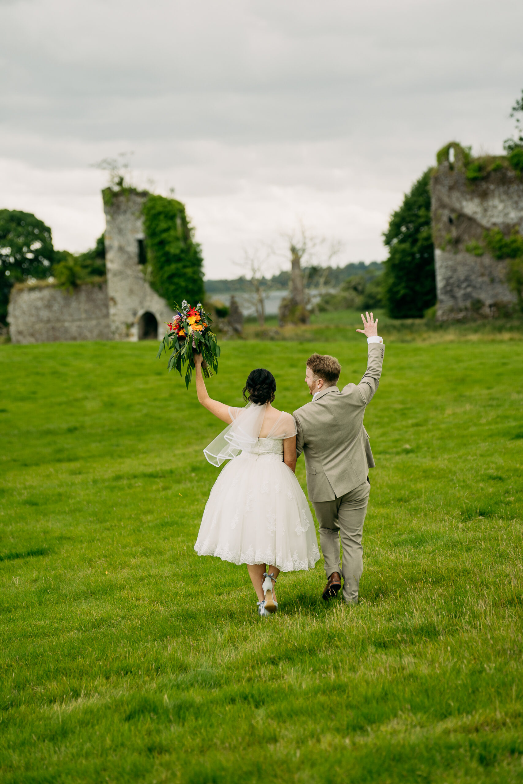 A man and woman holding flowers