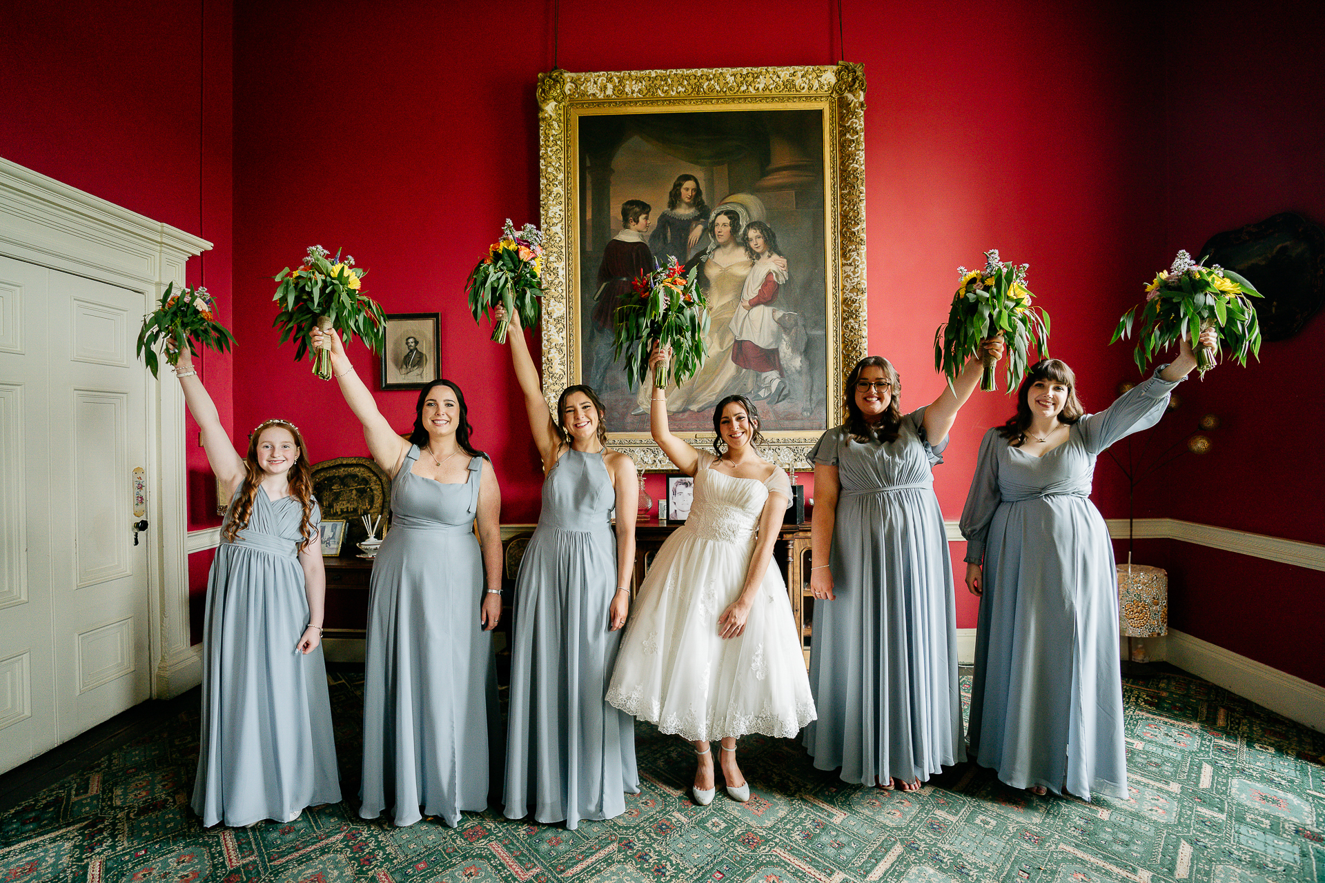 A group of women in white dresses