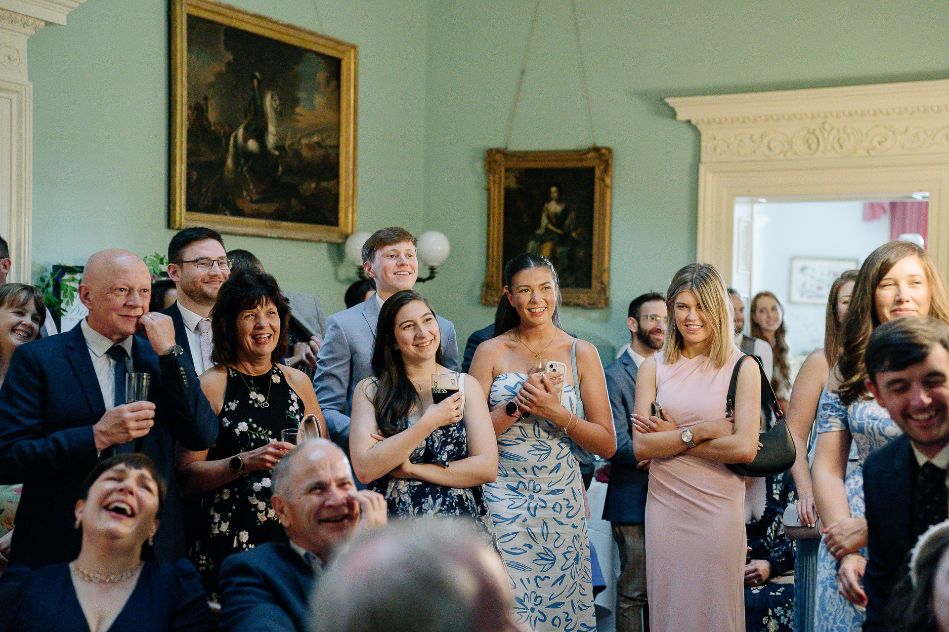 A group of people standing in a room