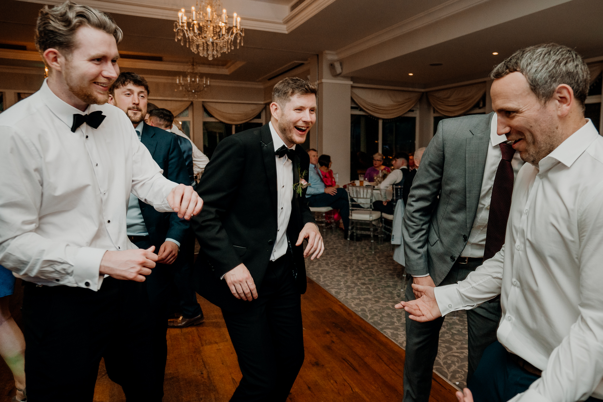 A group of men dancing