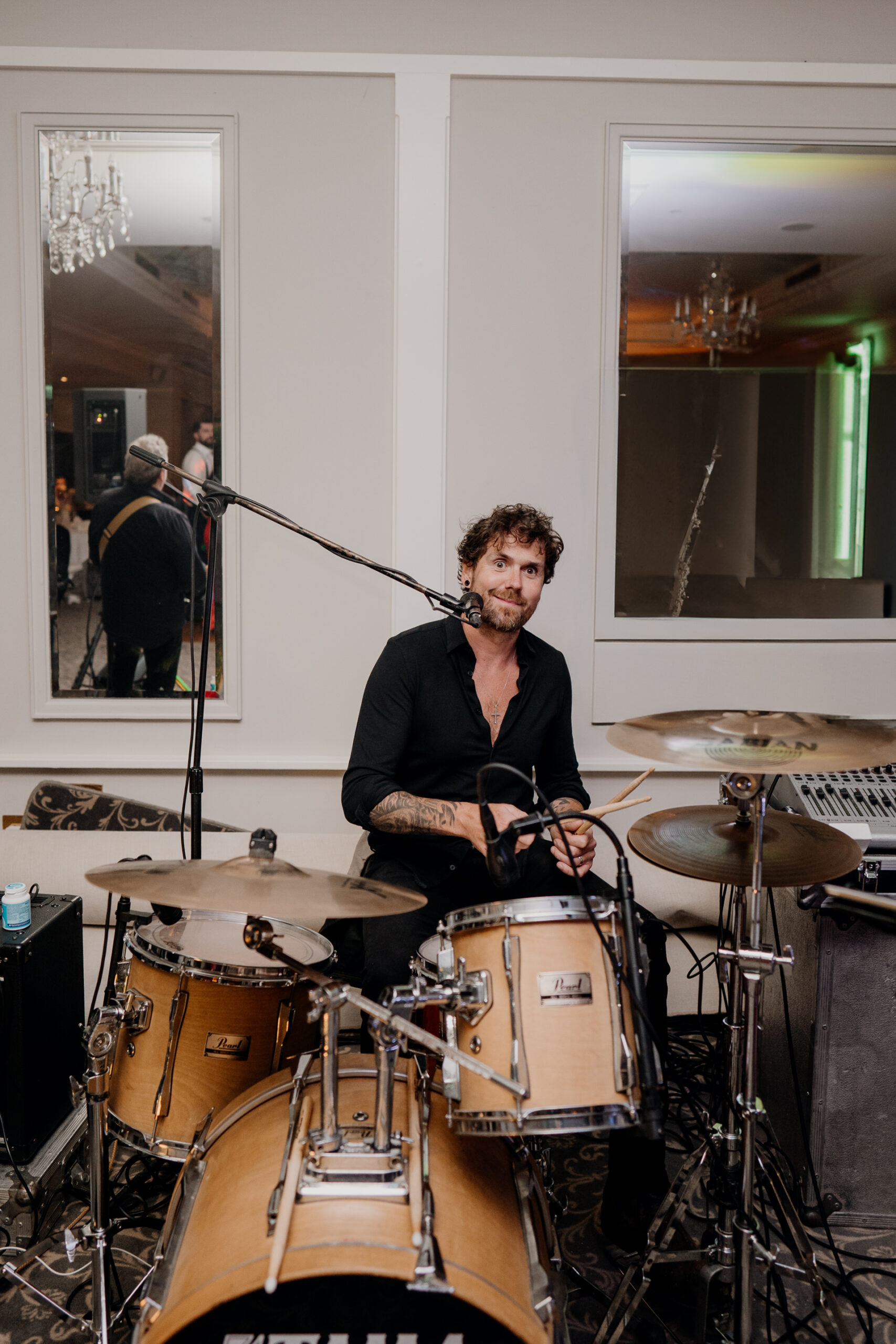 A person playing a drum set