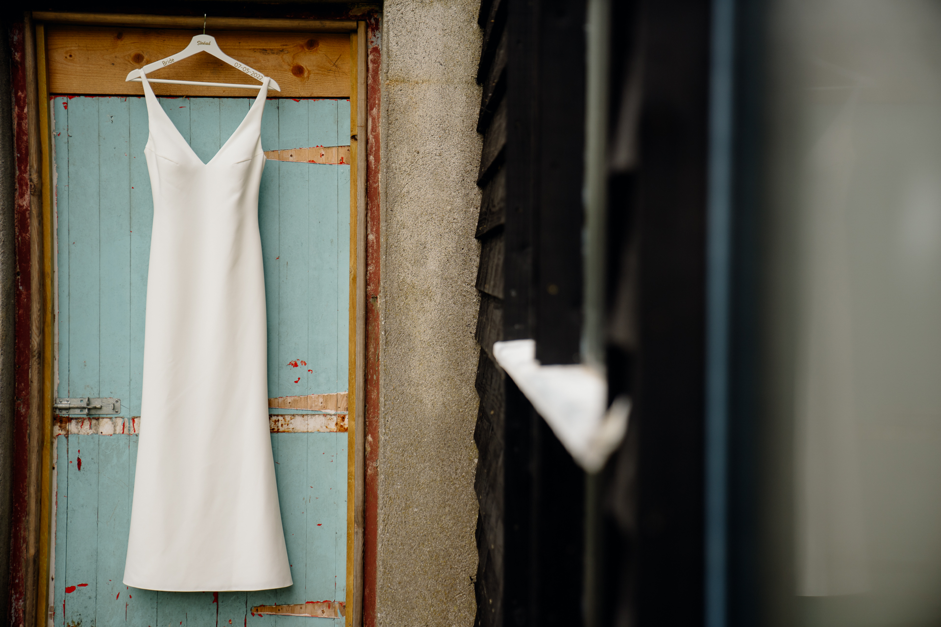 A white dress on a door