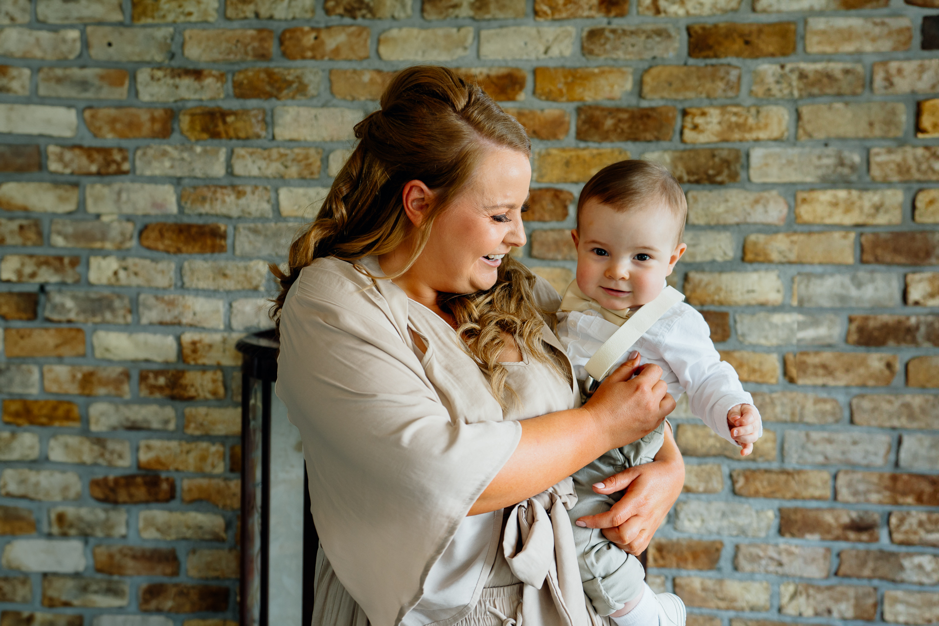 A woman holding a baby