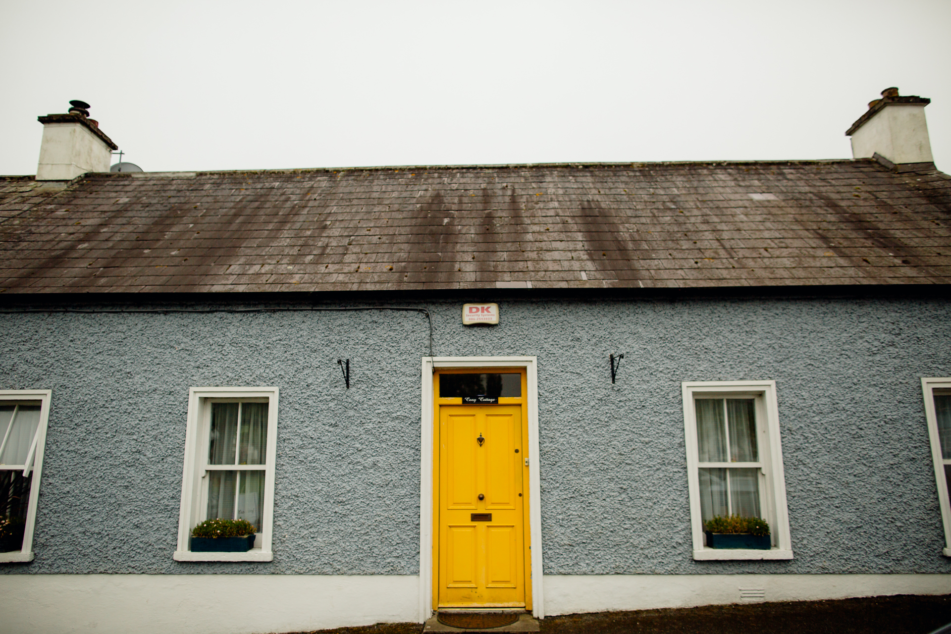 A house with a yellow door