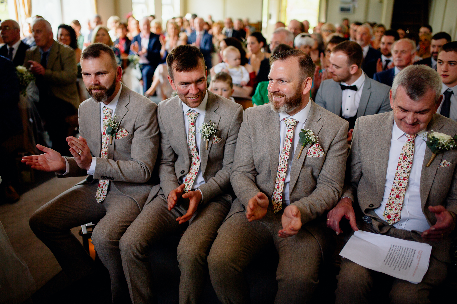 A group of men sitting in chairs