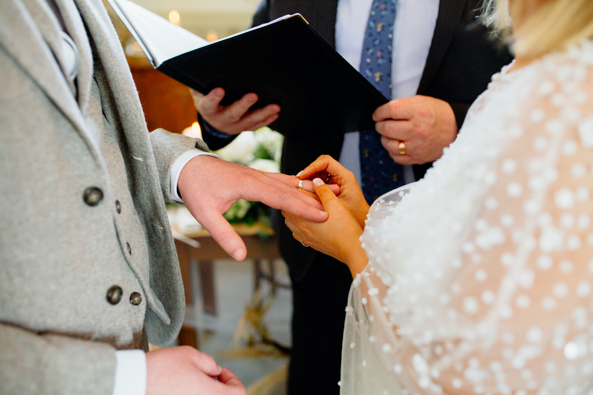 A woman showing a tablet to a man