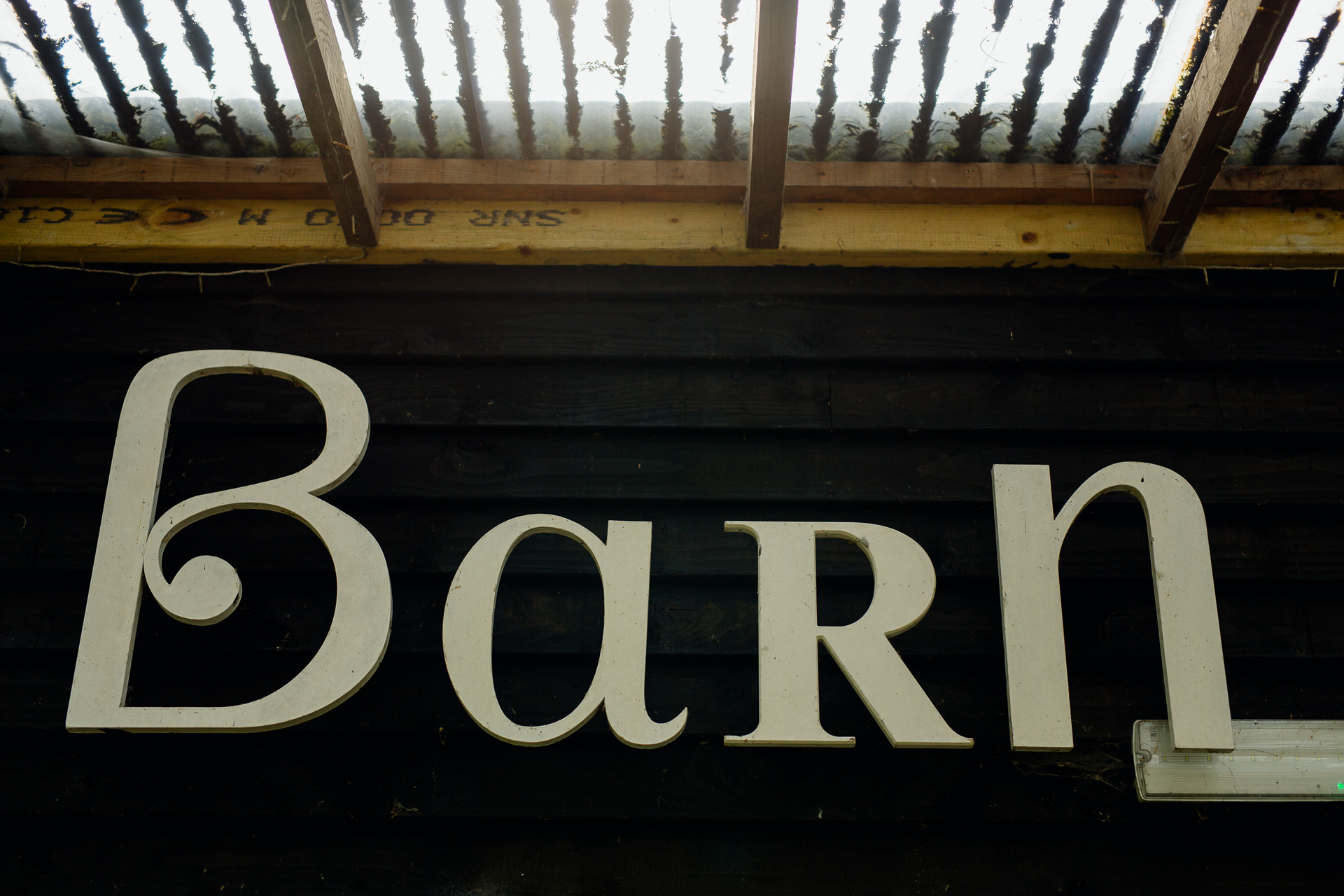 A sign on a wooden surface