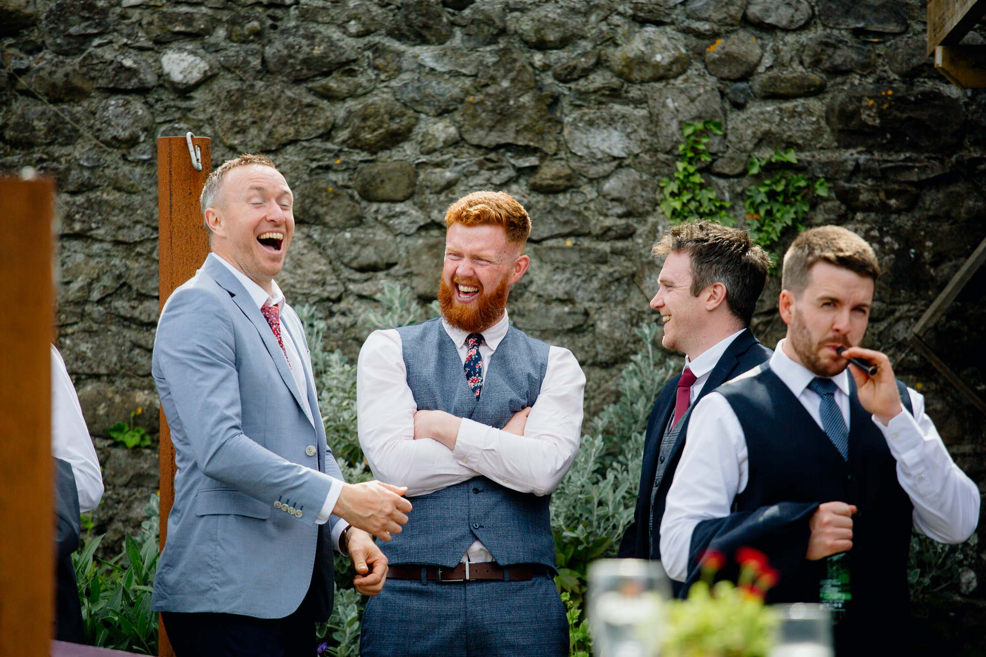 A group of men laughing