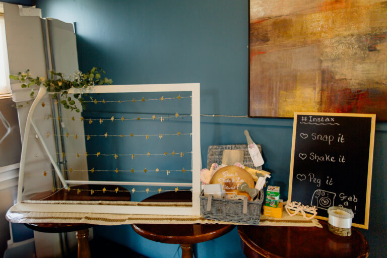 A piano with a basket of food and a sign