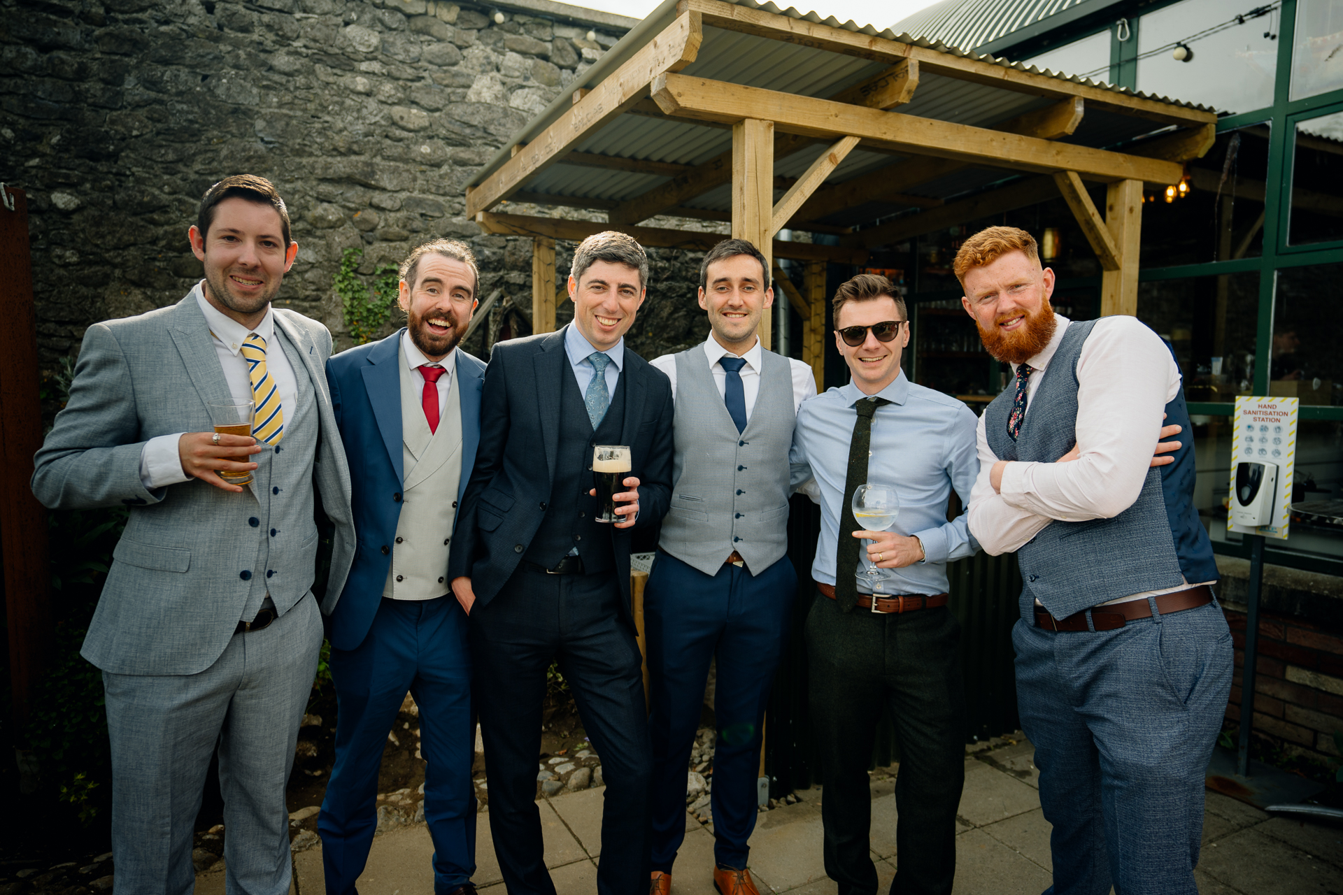 A group of men posing for a photo