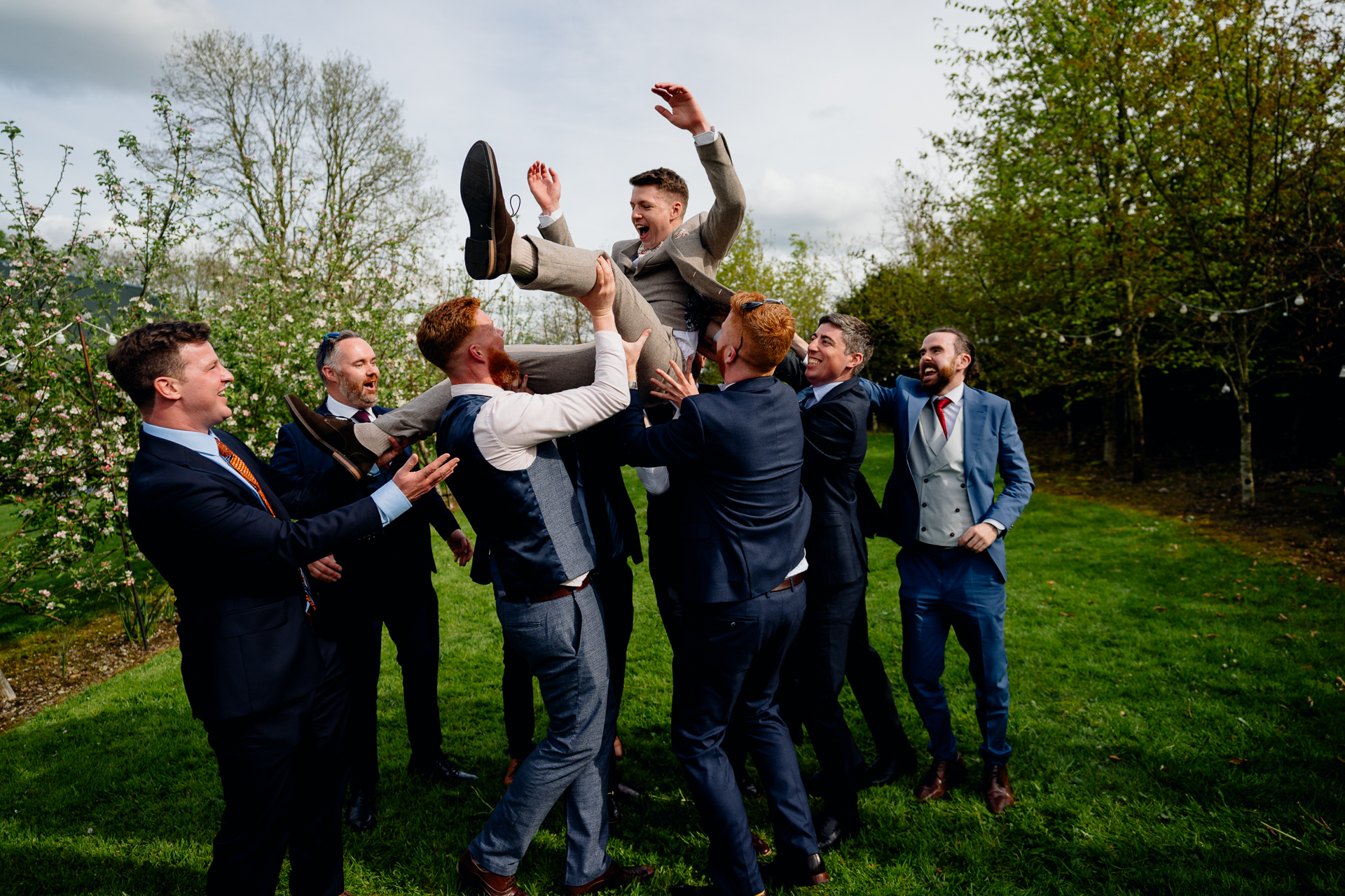 A group of men jumping in the air