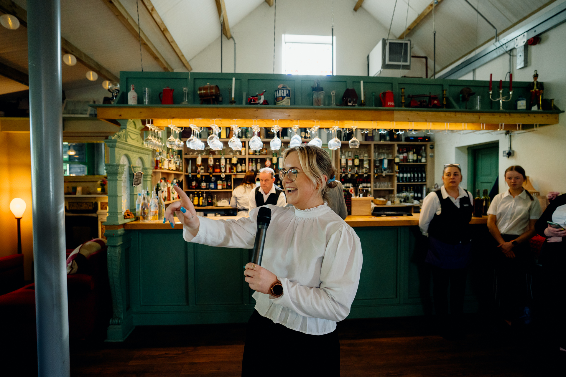 A man standing in a bar